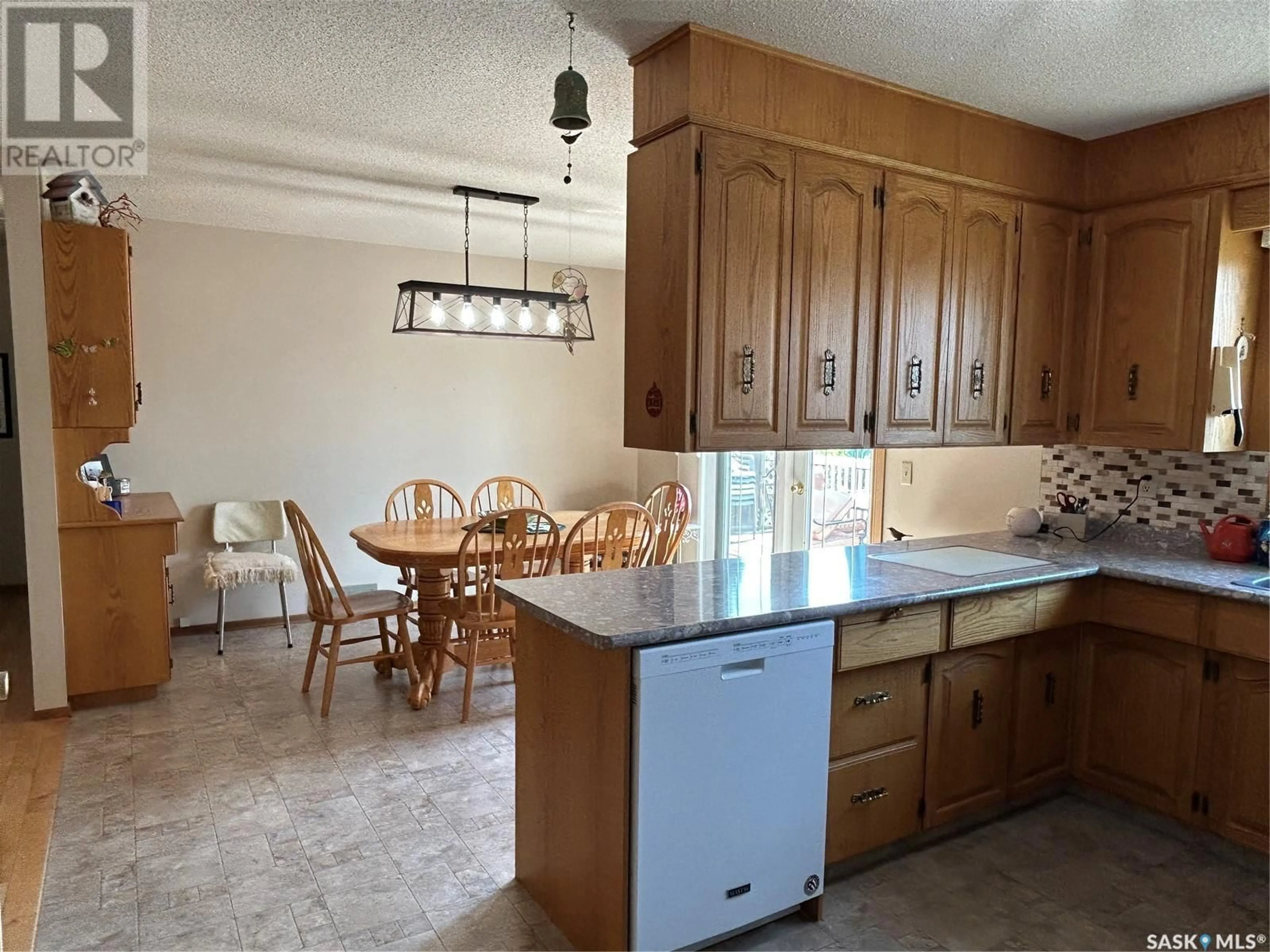 Open concept kitchen, ceramic/tile floor for 318 3RD AVENUE, Alameda Saskatchewan S0C0A0