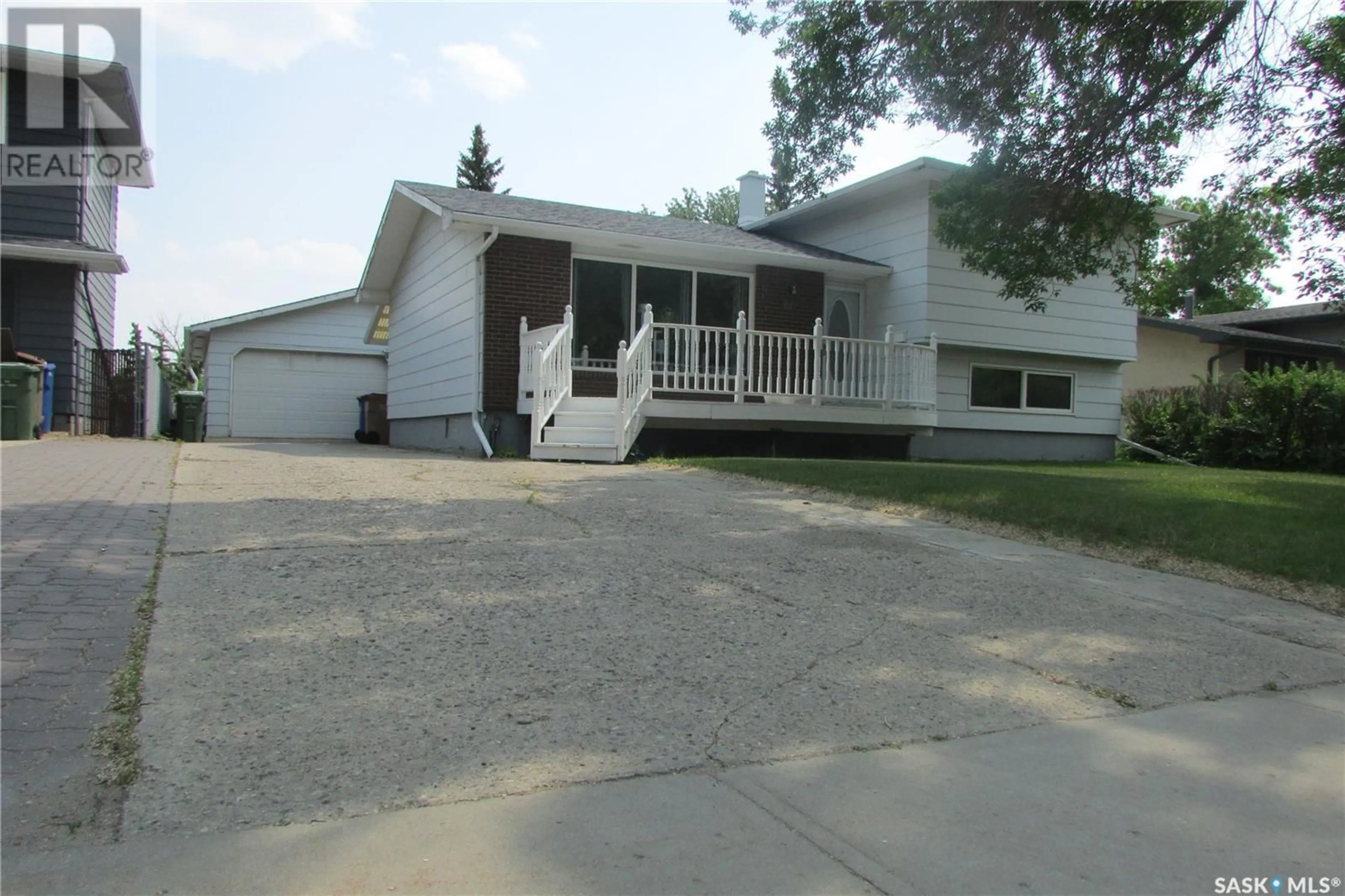 Home with vinyl exterior material, street for 227 RODENBUSH DRIVE, Regina Saskatchewan S4R6X1