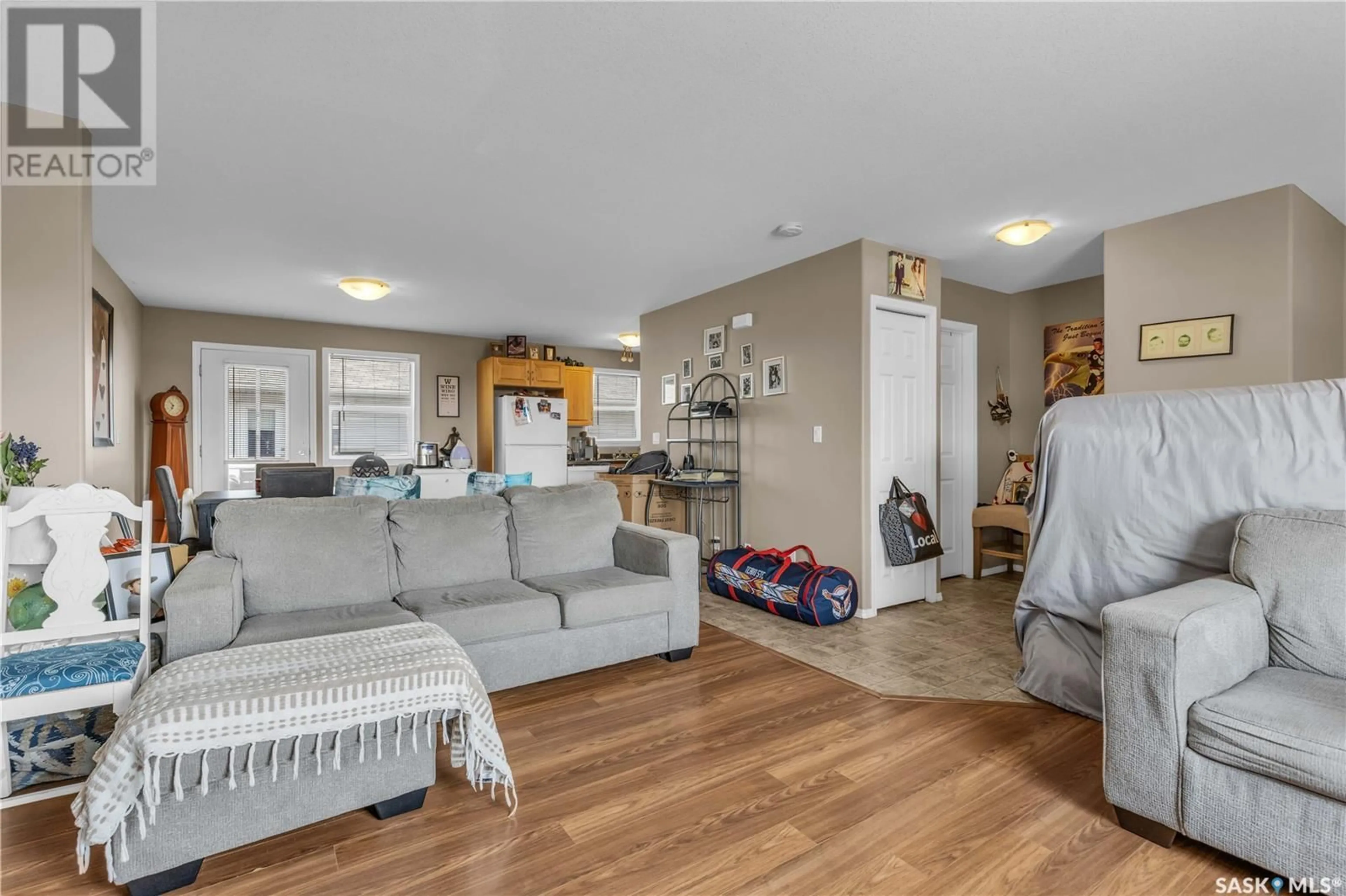 Living room with furniture, unknown for 8 200 HIEBERT CRESCENT, Martensville Saskatchewan S0K2T2