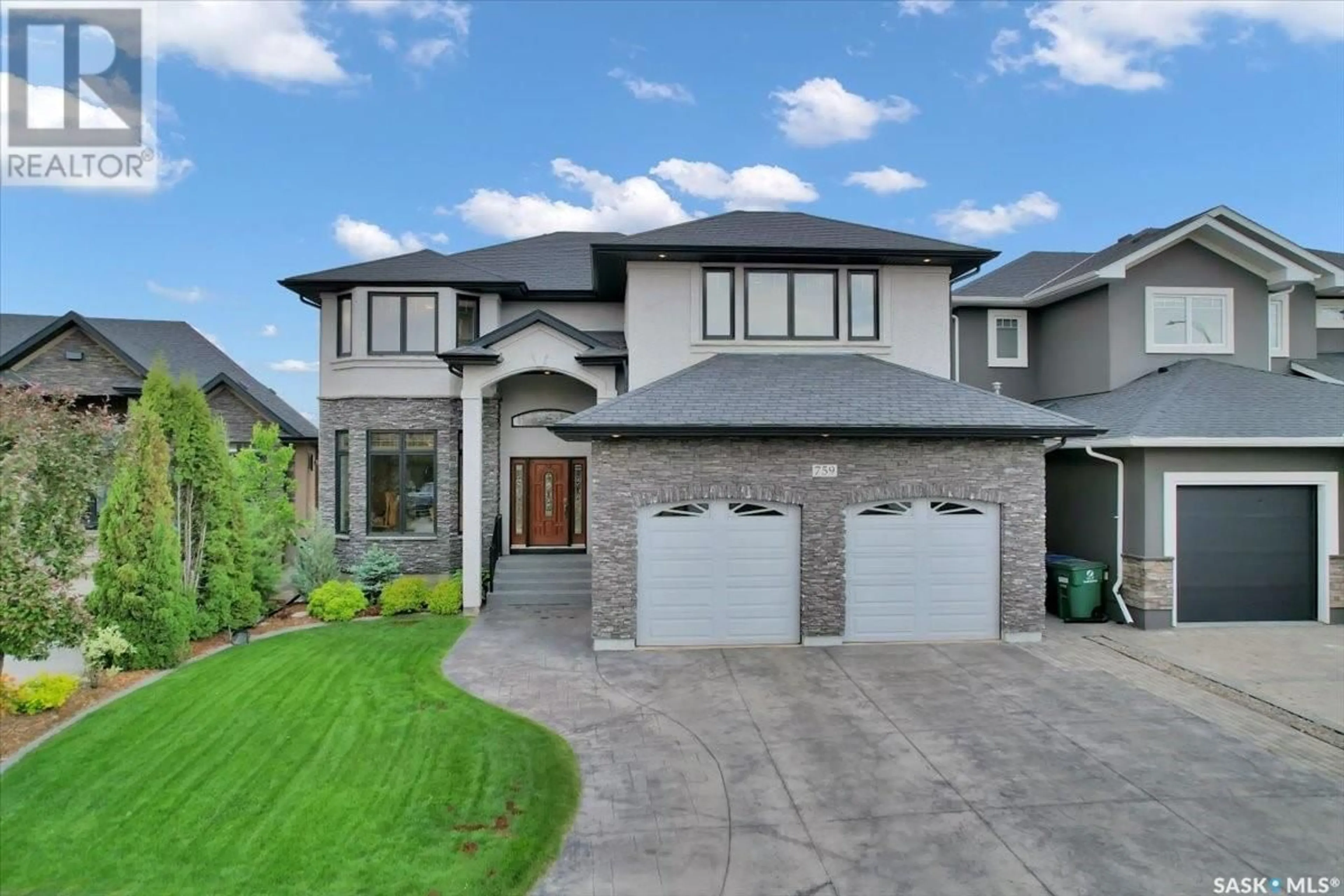 Home with brick exterior material, street for 759 BEECHDALE WAY, Saskatoon Saskatchewan S7V0A6