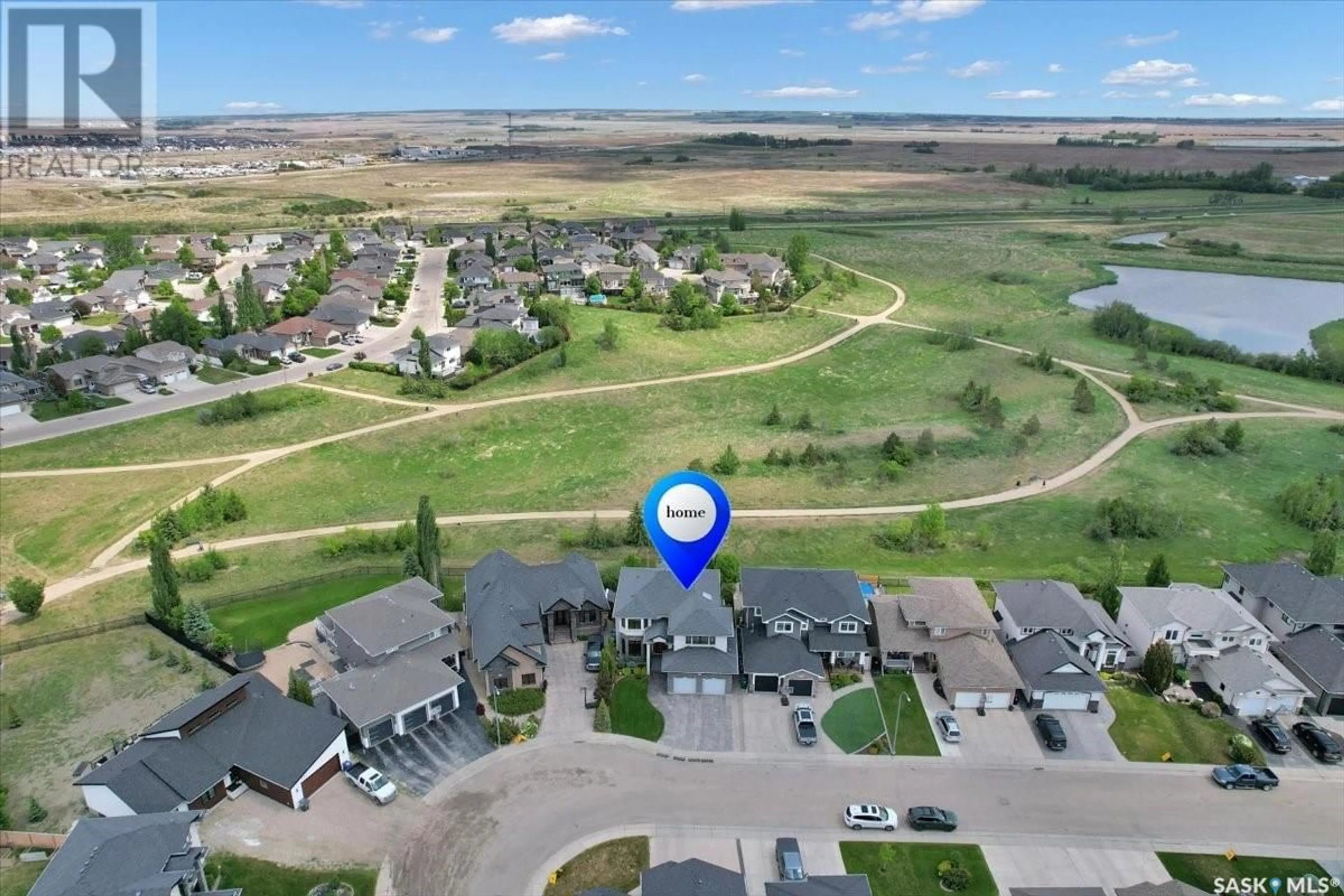 A pic from outside/outdoor area/front of a property/back of a property/a pic from drone, water/lake/river/ocean view for 759 BEECHDALE WAY, Saskatoon Saskatchewan S7V0A6
