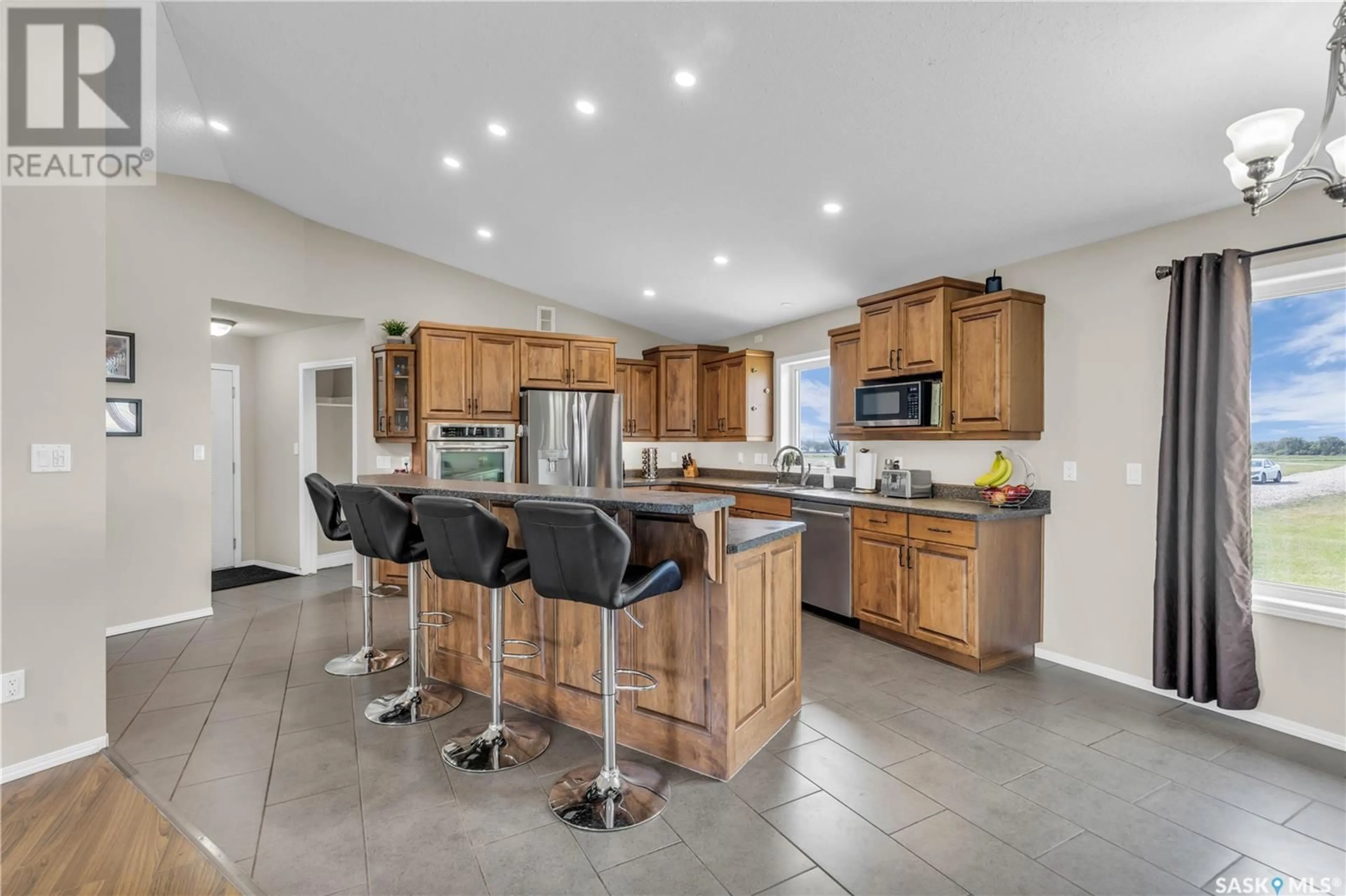 Open concept kitchen, ceramic/tile floor for SUNSET VIEW ACREAGE, Vanscoy Rm No. 345 Saskatchewan S0K1V0