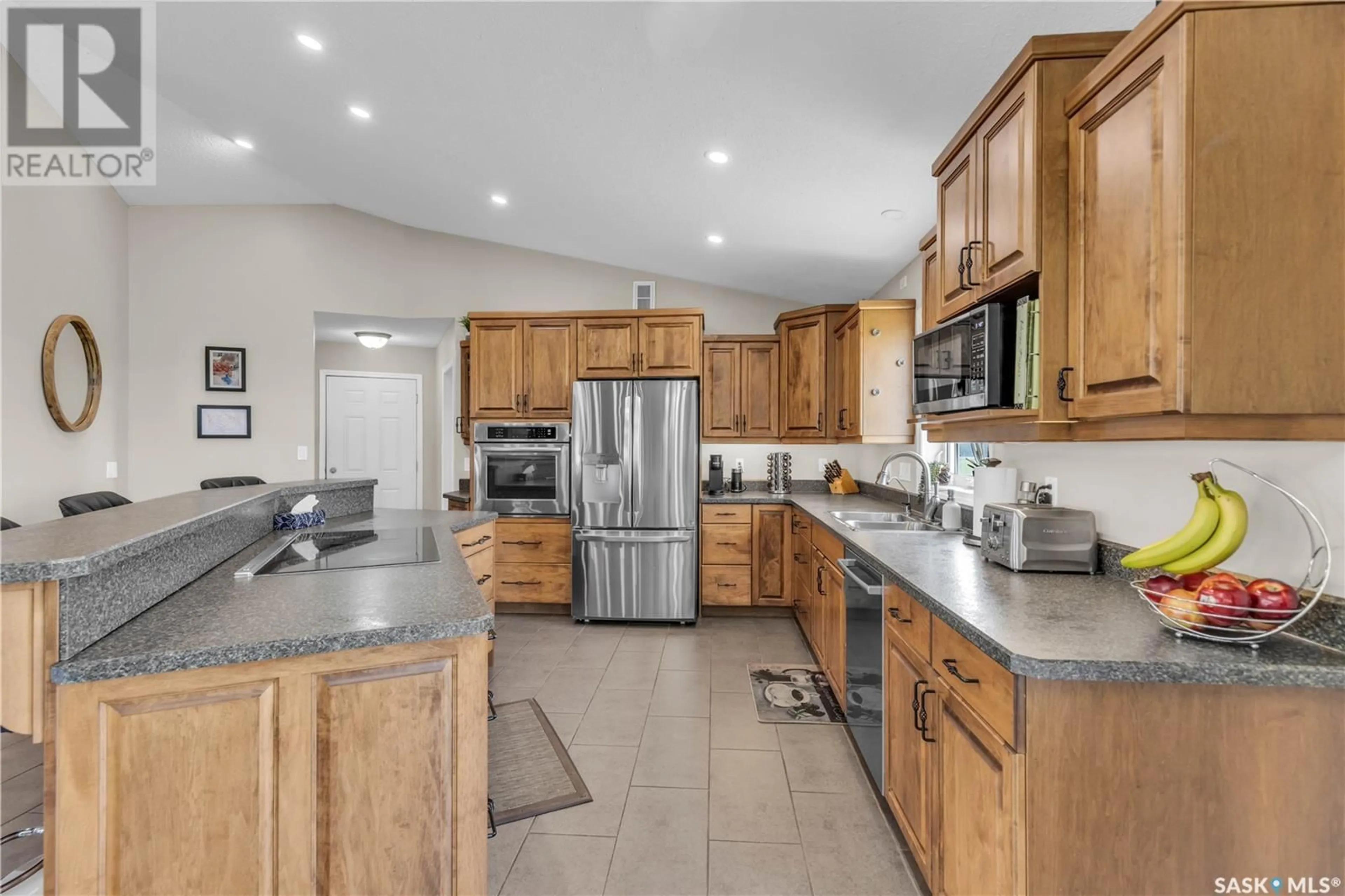 Open concept kitchen, ceramic/tile floor for SUNSET VIEW ACREAGE, Vanscoy Rm No. 345 Saskatchewan S0K1V0