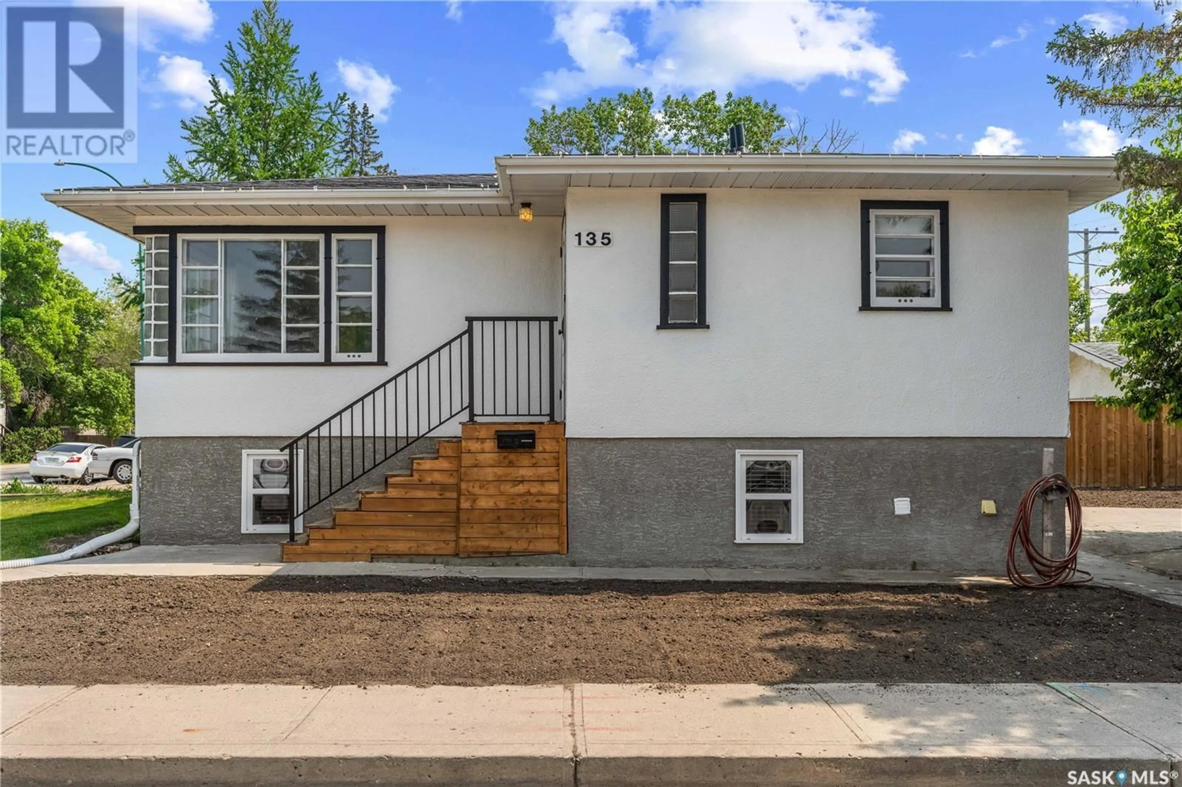 Home with vinyl exterior material, street for 135 COLLEGE AVENUE, Regina Saskatchewan S4N0W4