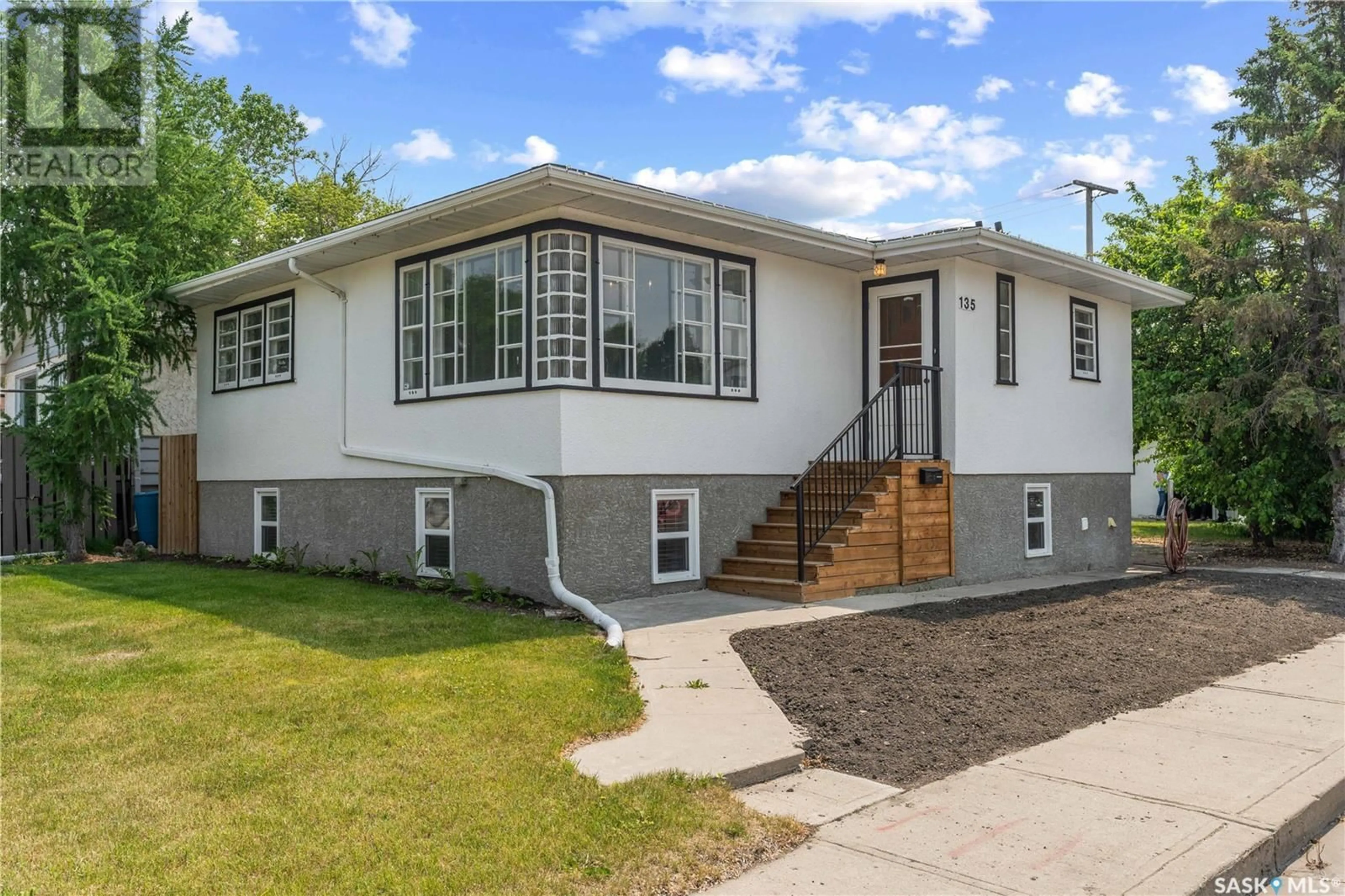 Home with vinyl exterior material, street for 135 COLLEGE AVENUE, Regina Saskatchewan S4N0W4