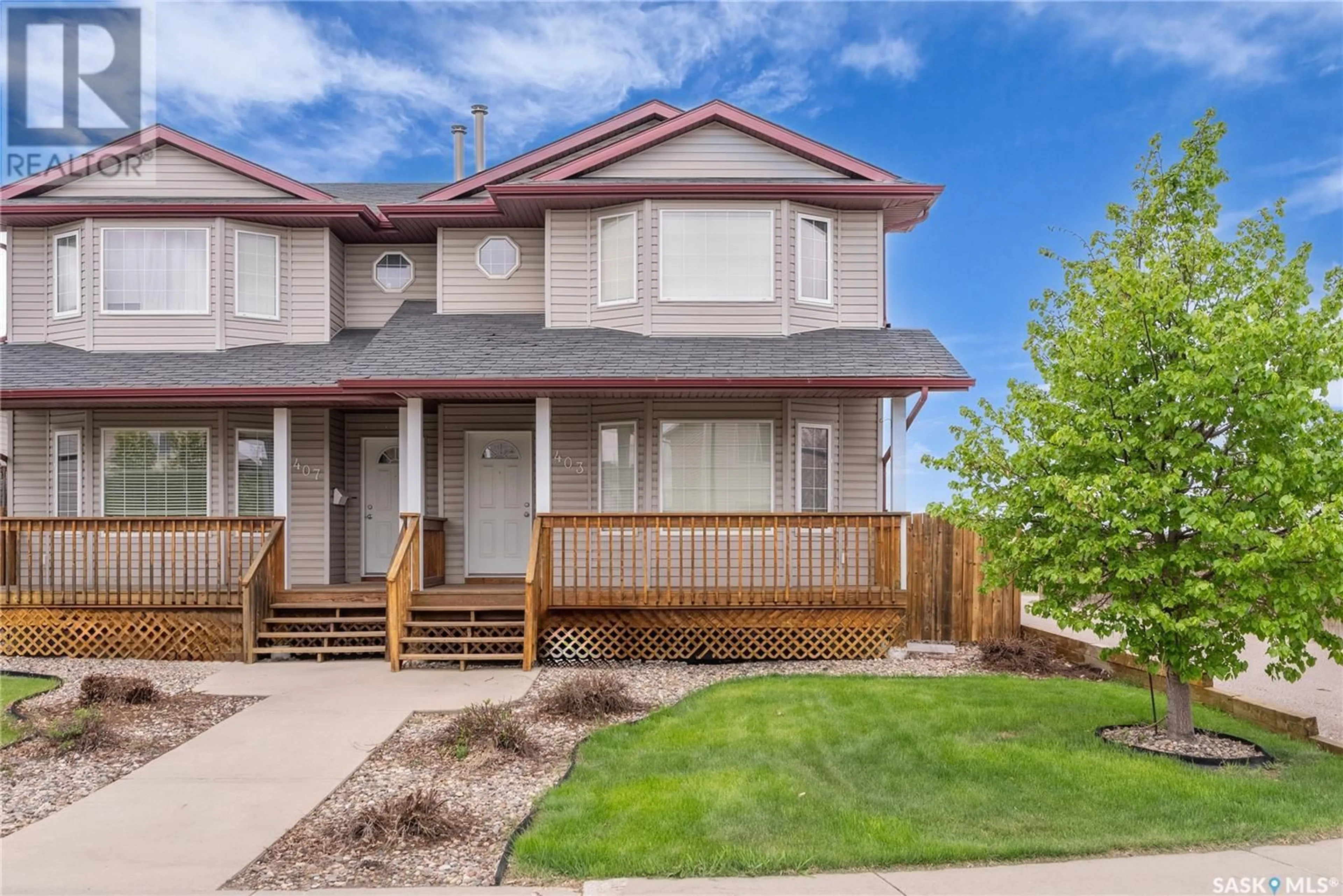 Home with vinyl exterior material, street for 403 RUTHERFORD CRESCENT, Saskatoon Saskatchewan S7N4X7