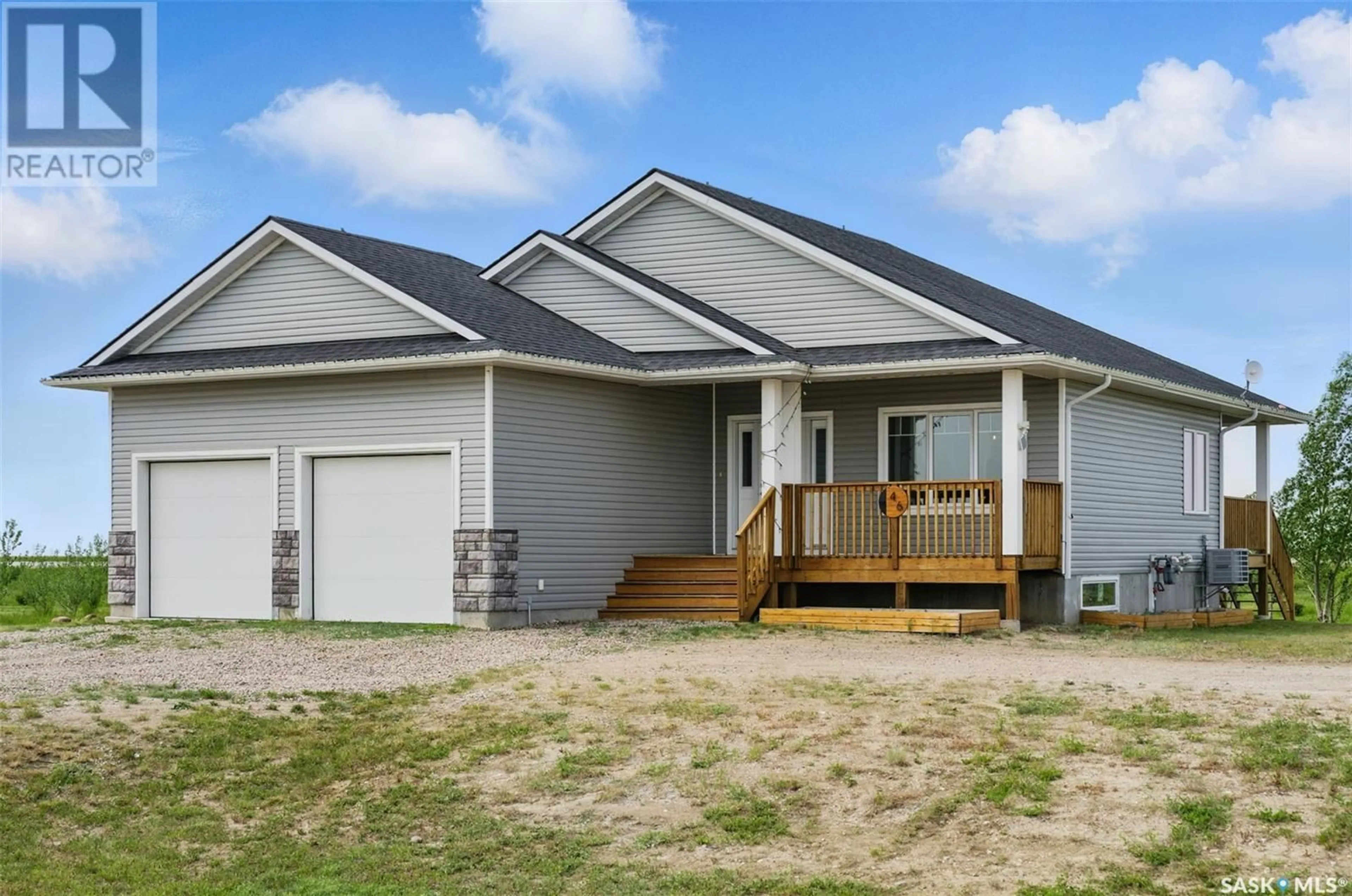 Home with vinyl exterior material, street for 46 SUNRISE DRIVE, Dundurn Rm No. 314 Saskatchewan S7C0A6