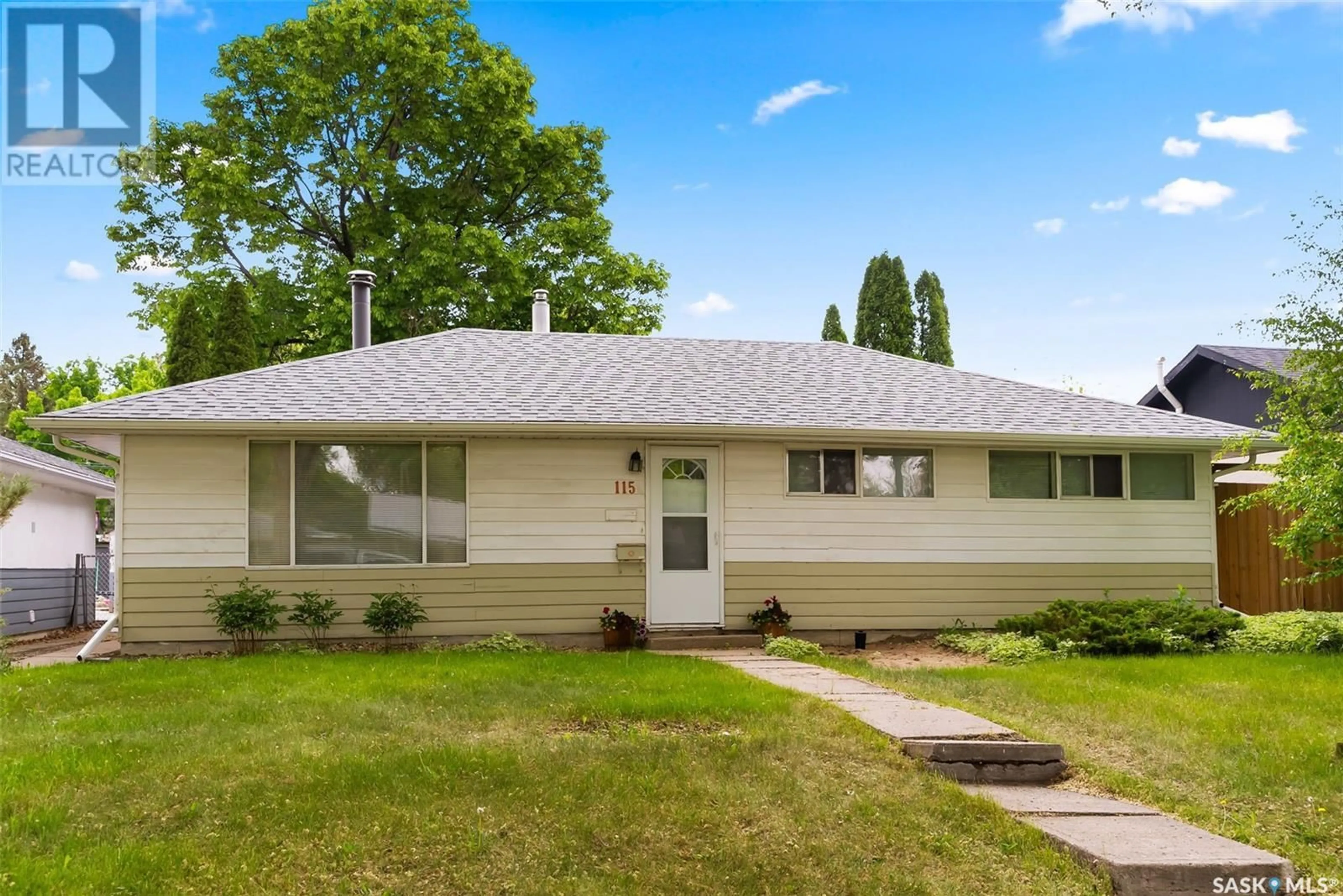 Home with vinyl exterior material, street for 115 RETALLACK STREET, Regina Saskatchewan S4R3M9