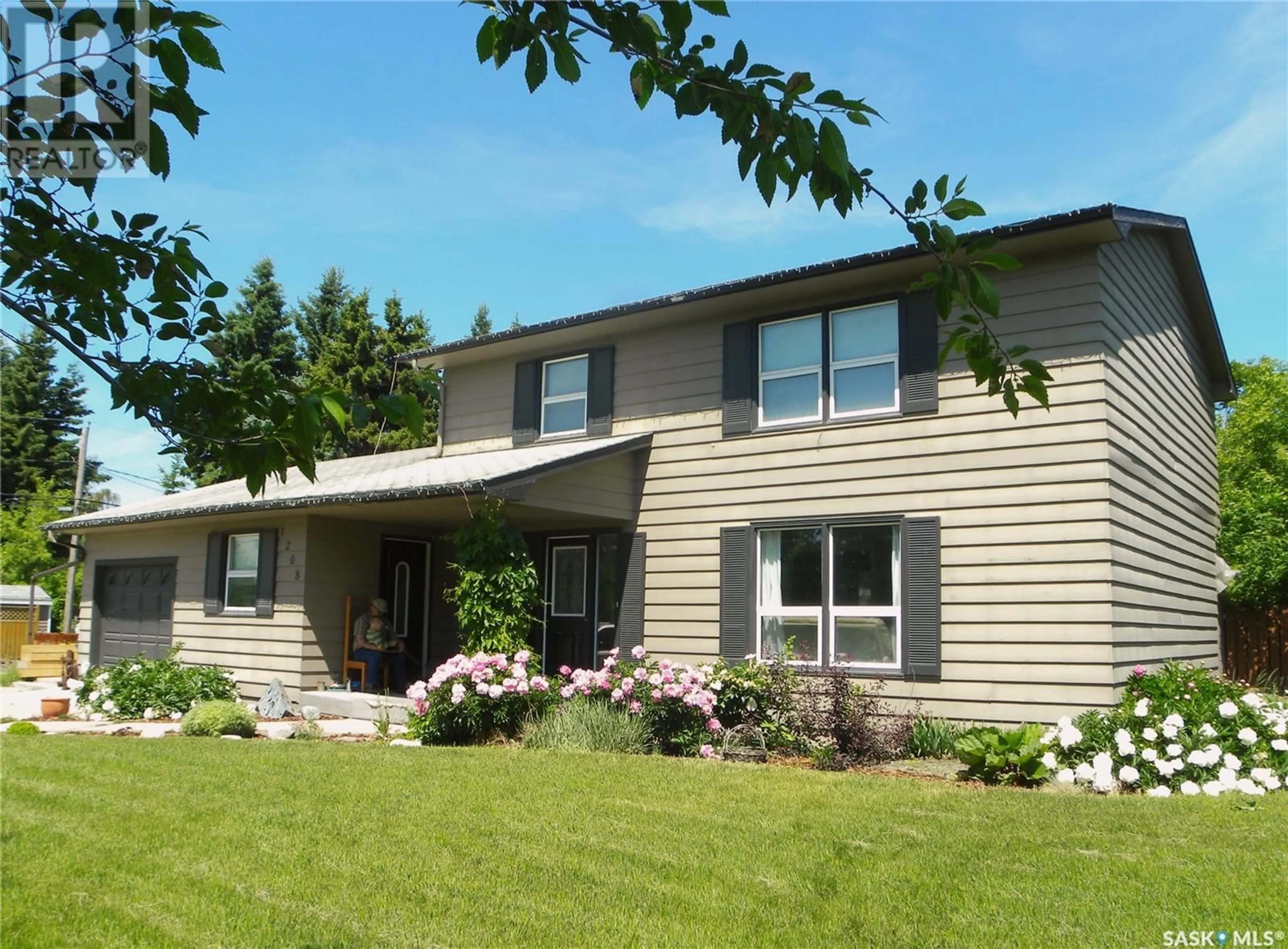 Home with vinyl exterior material, unknown for 1208 11TH AVENUE, Humboldt Saskatchewan S0K2A0