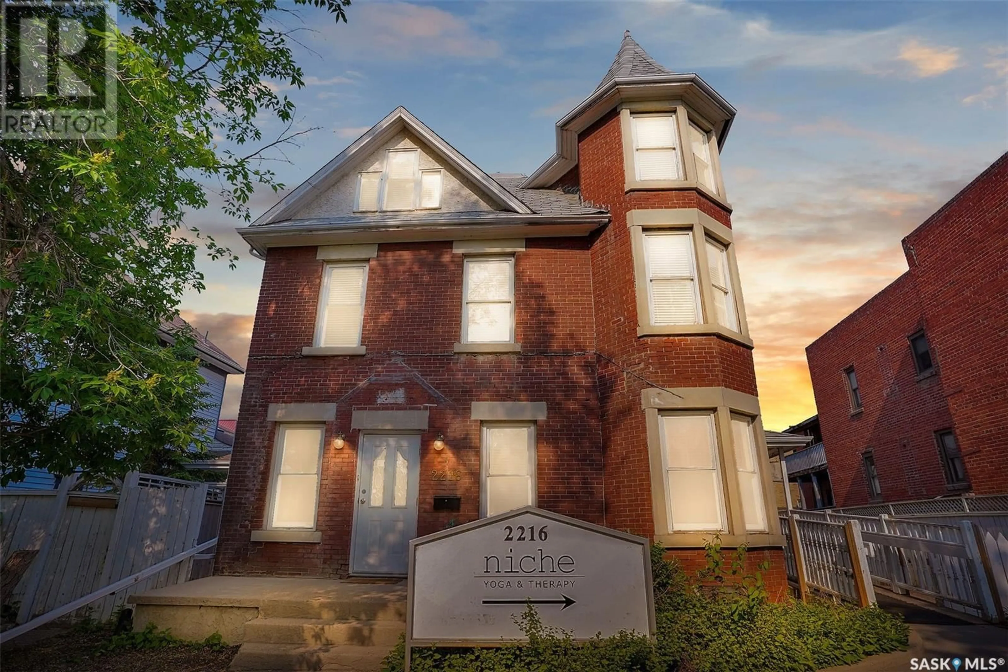 Home with brick exterior material, street for 2216 LORNE STREET, Regina Saskatchewan S4P2M7