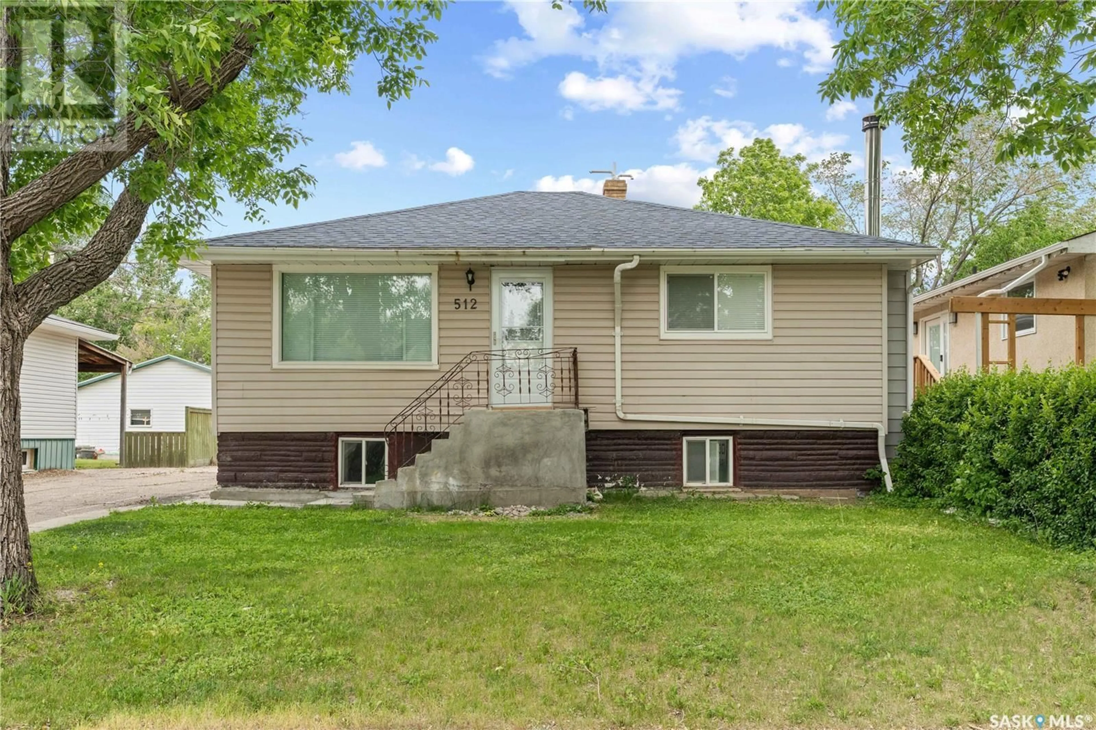 Home with vinyl exterior material, street for E - 512 18TH AVENUE, Regina Saskatchewan S4N1E4