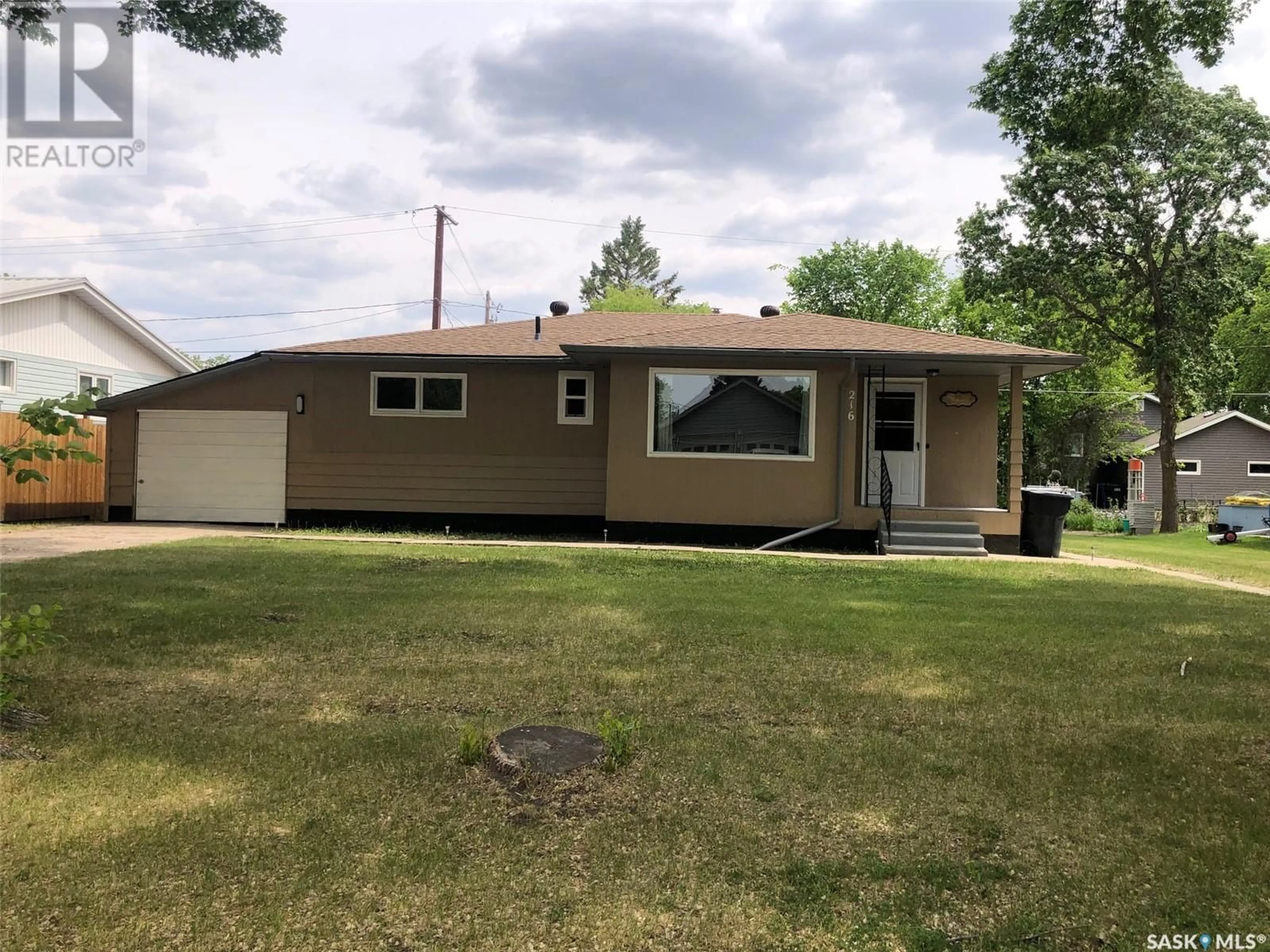 Home with vinyl exterior material, street for 216 MARY STREET, Canora Saskatchewan S0A0L0