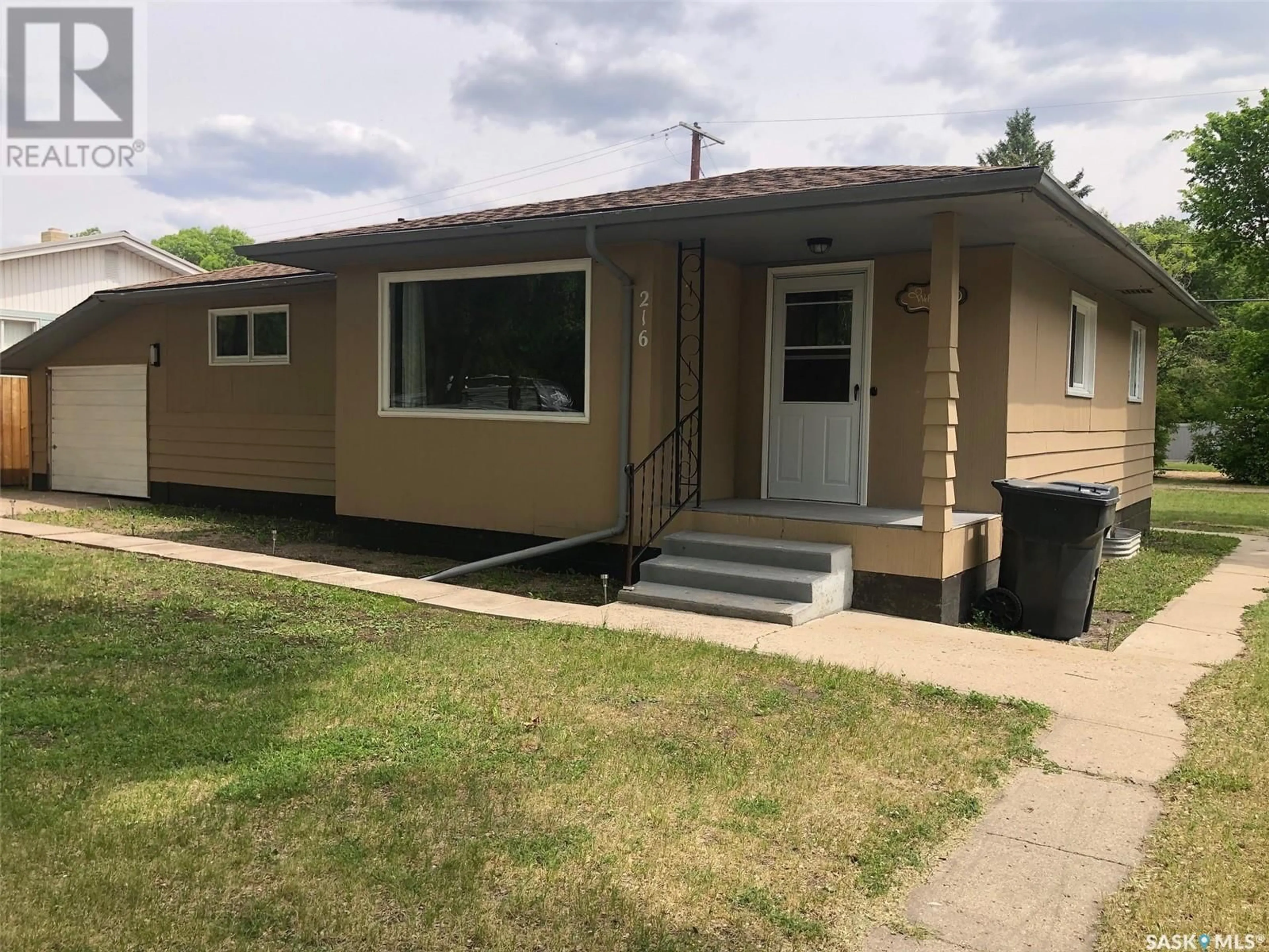 Home with vinyl exterior material, street for 216 MARY STREET, Canora Saskatchewan S0A0L0