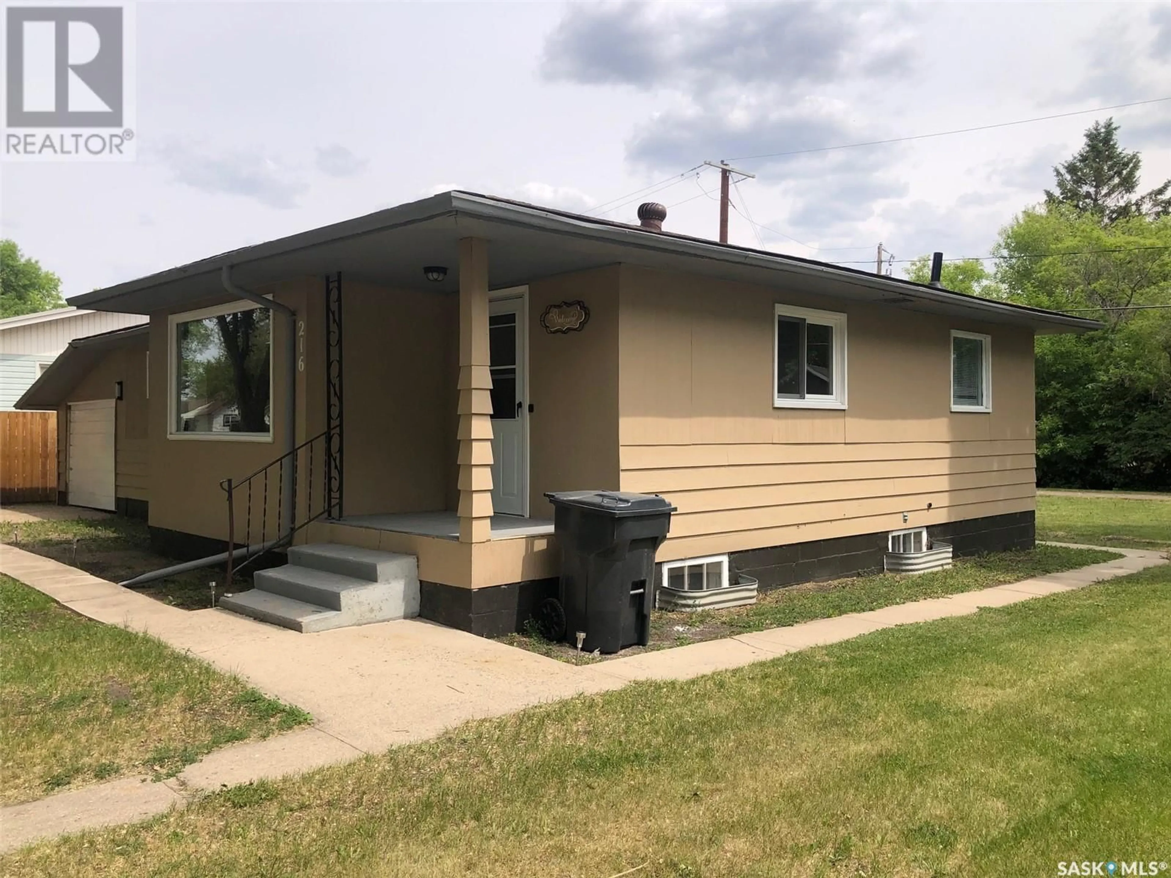 Home with vinyl exterior material, street for 216 MARY STREET, Canora Saskatchewan S0A0L0