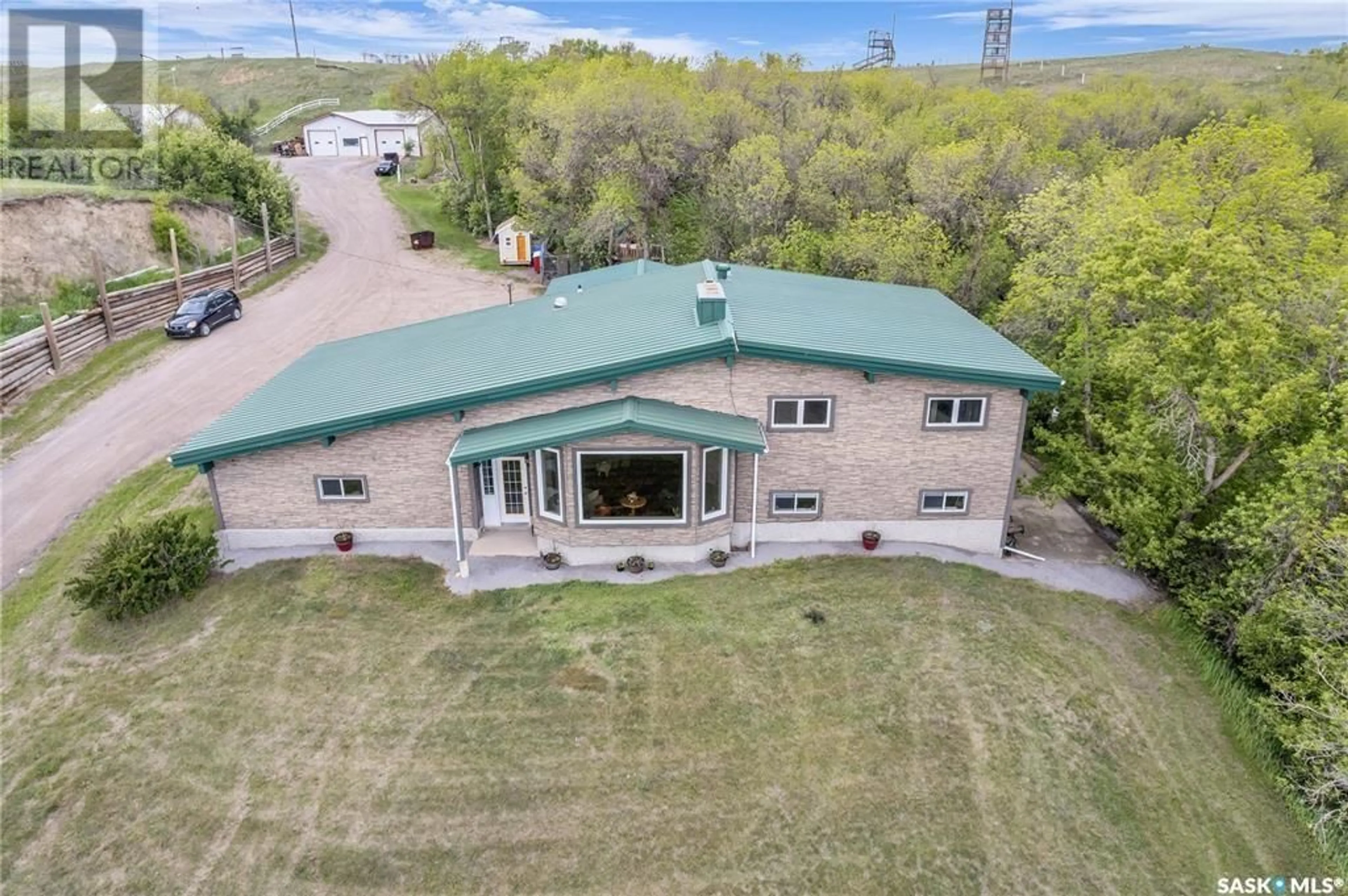 A pic from outside/outdoor area/front of a property/back of a property/a pic from drone, building for LUMSDEN, Lumsden Rm No. 189 Saskatchewan S0G3C0