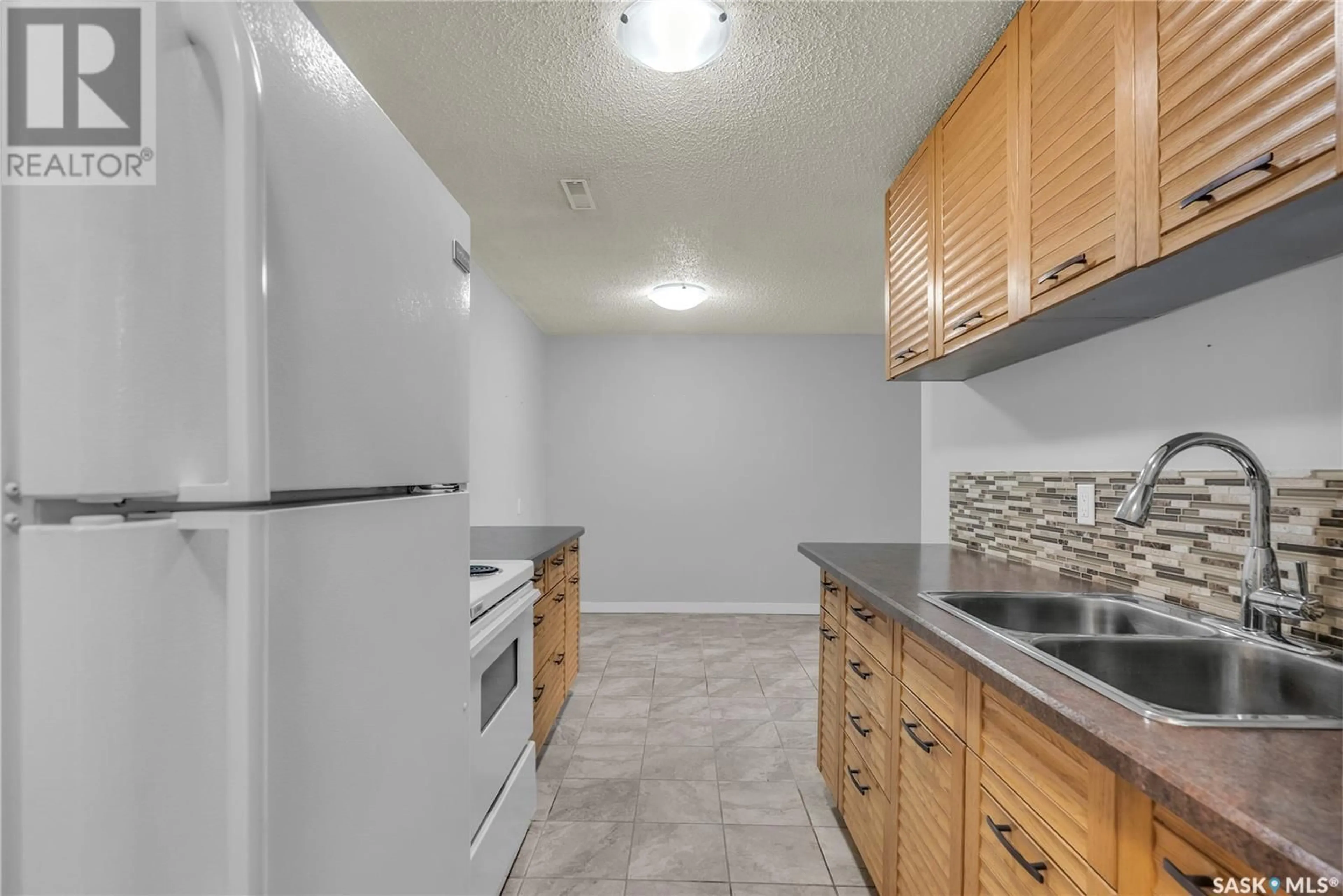 Standard kitchen, ceramic/tile floor for 117 - 4230 DEGEER STREET, Saskatoon Saskatchewan S7H5G9