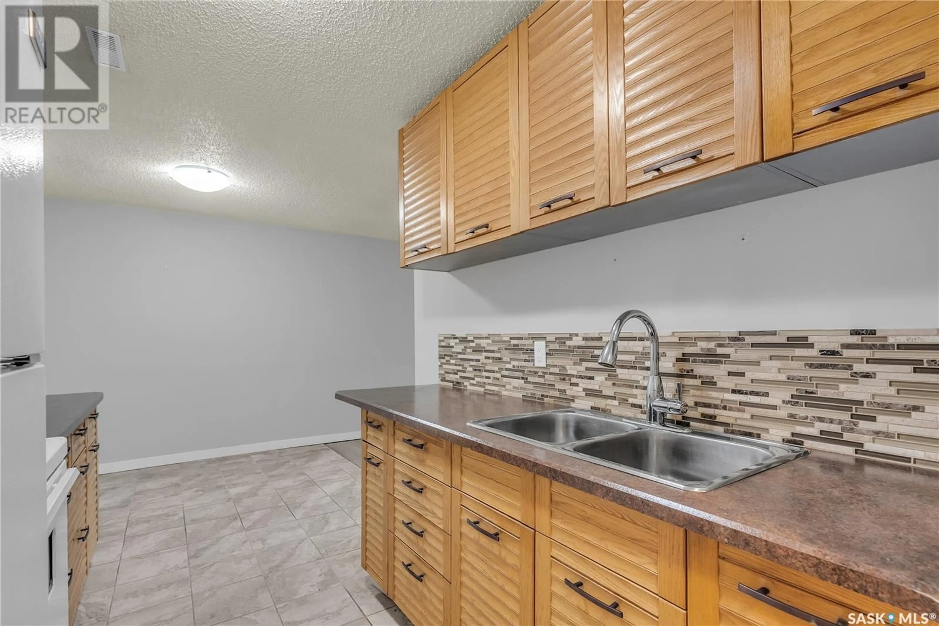 Standard kitchen, ceramic/tile floor for 117 - 4230 DEGEER STREET, Saskatoon Saskatchewan S7H5G9
