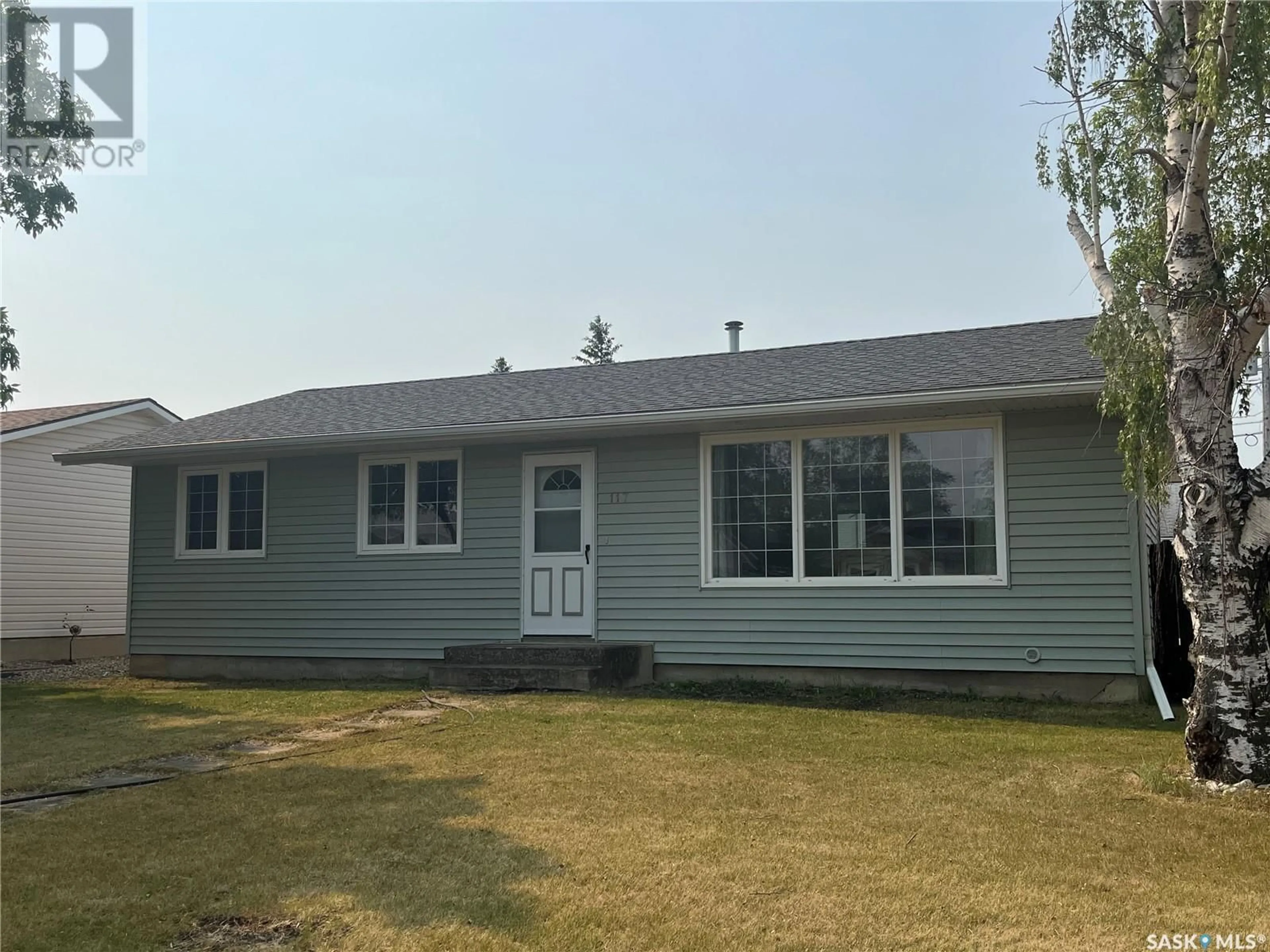 Home with vinyl exterior material, street for 117 KINGSTON STREET, Melfort Saskatchewan S0E1A0