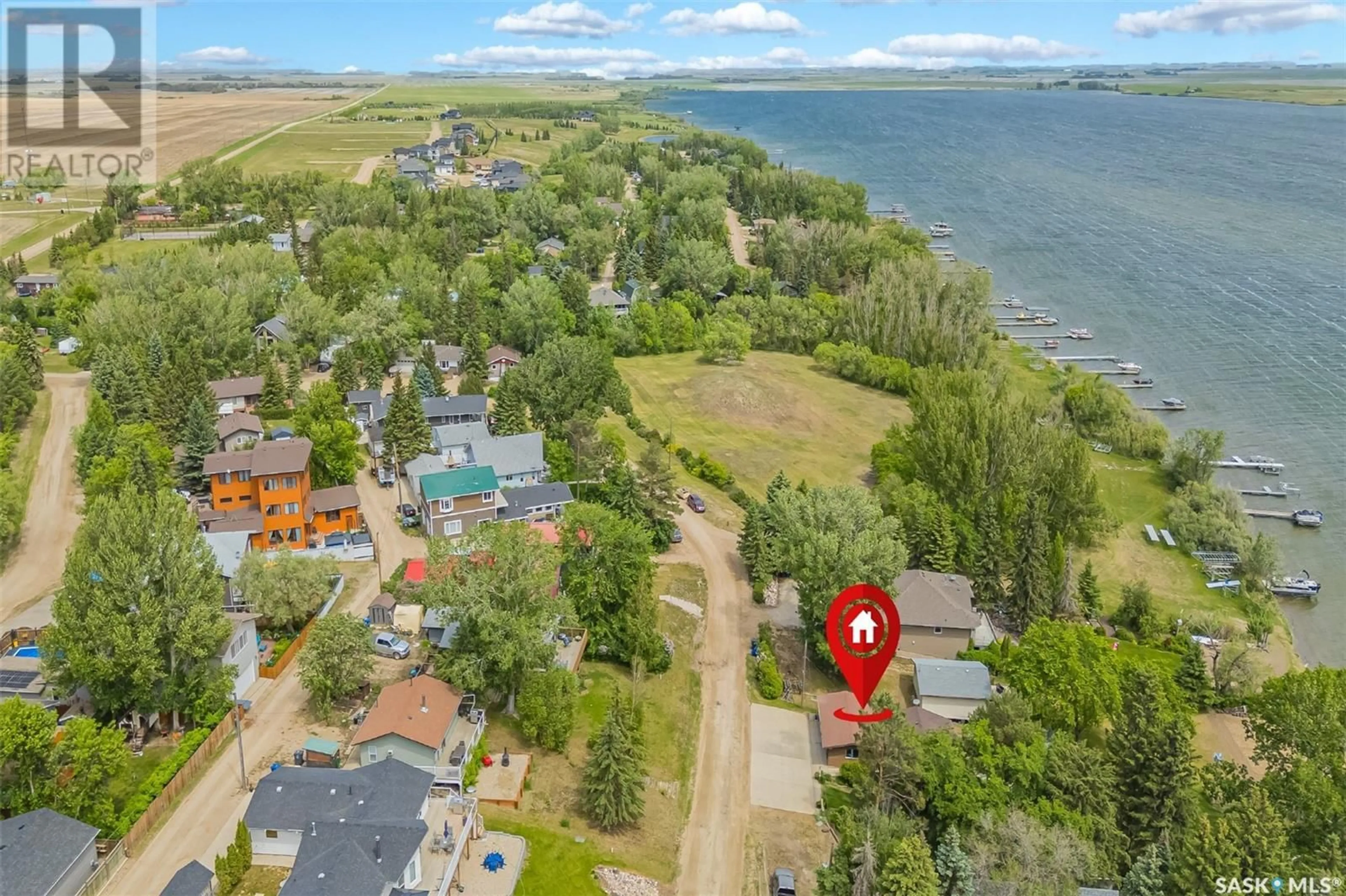 A pic from outside/outdoor area/front of a property/back of a property/a pic from drone, water/lake/river/ocean view for 25 MCCRIMMON CRESCENT, Shields Saskatchewan S7C0A2