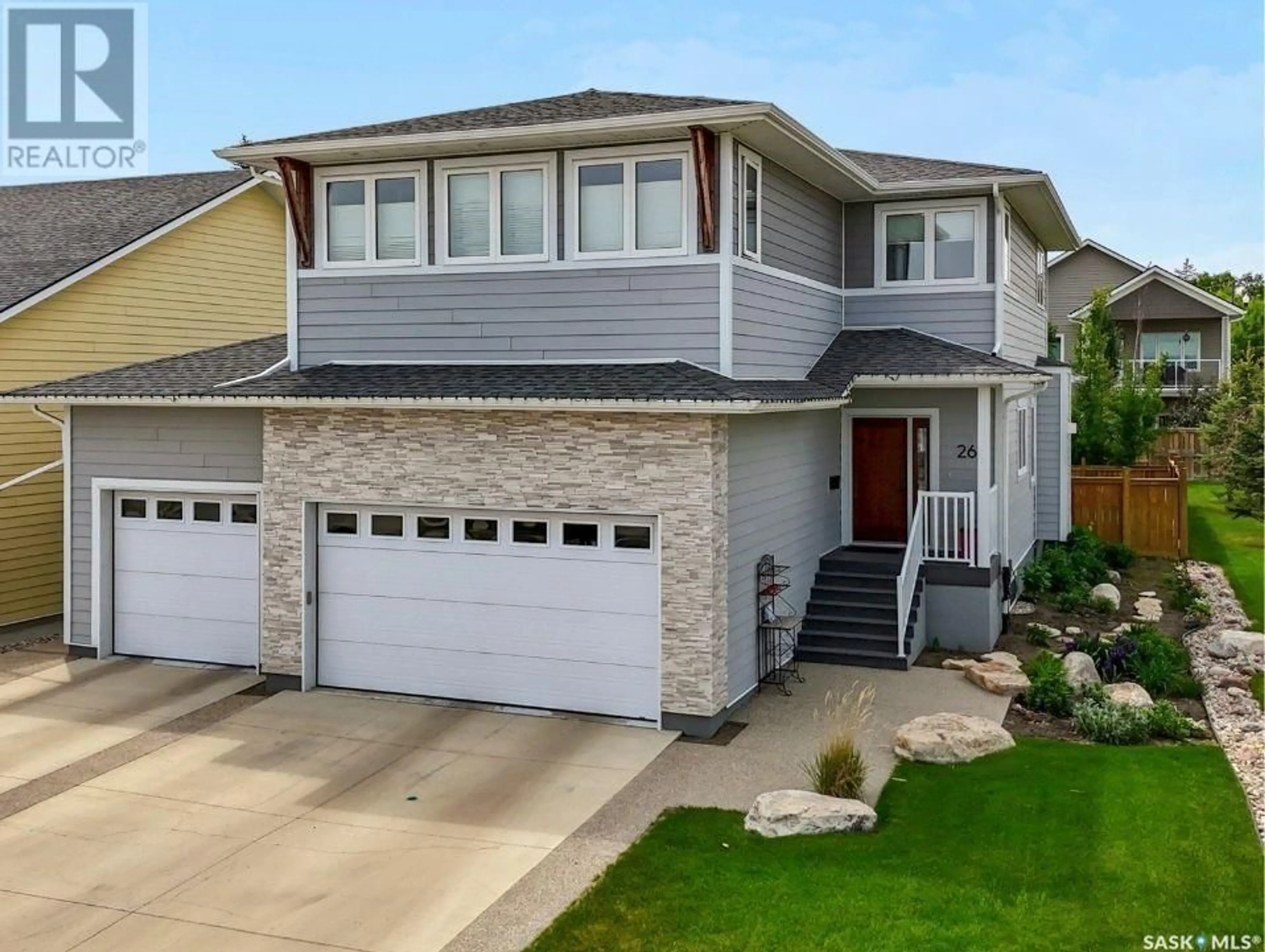 Home with vinyl exterior material, street for 26 533 4TH AVENUE NE, Swift Current Saskatchewan S9H2J9