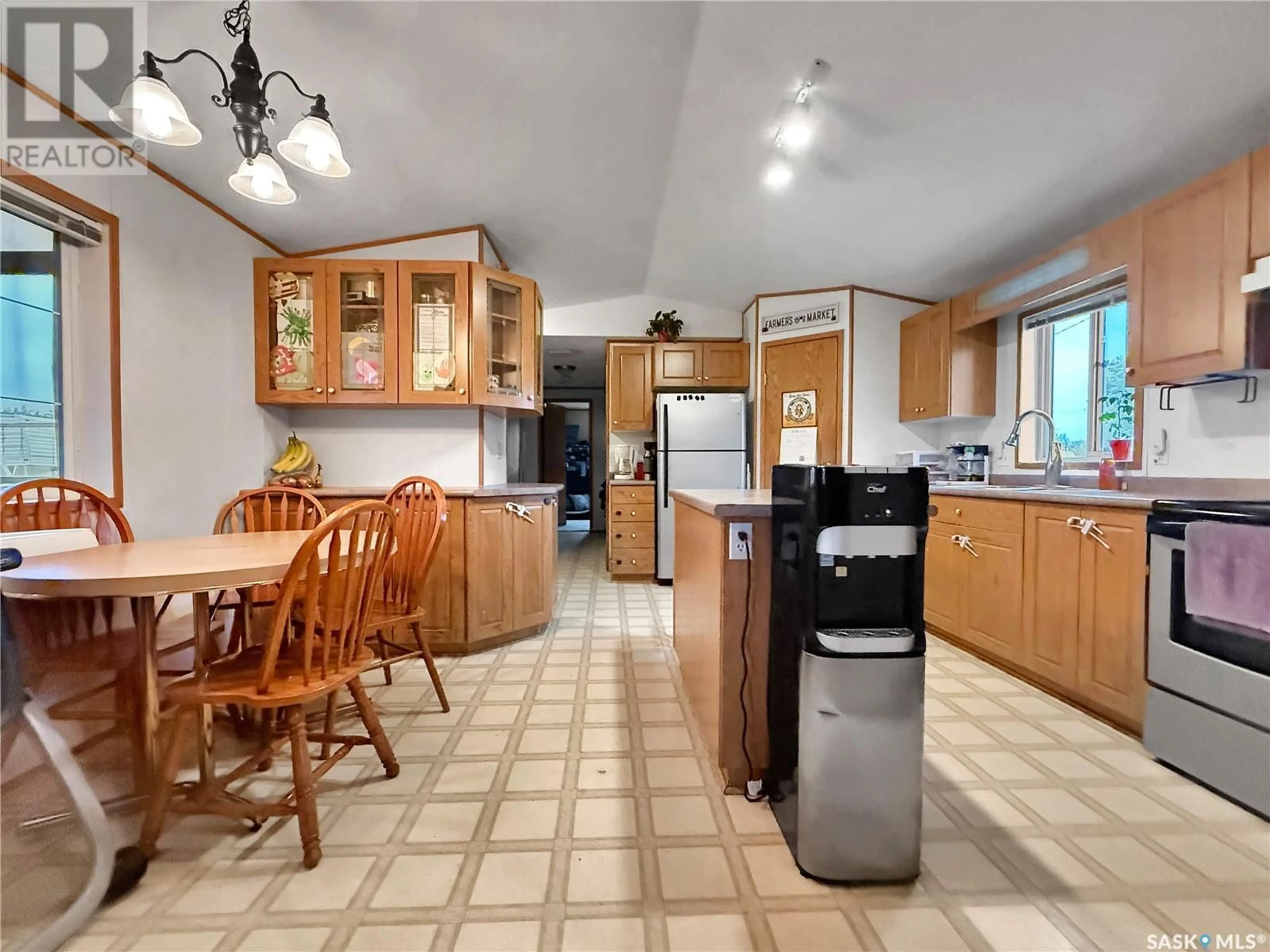 Open concept kitchen, ceramic/tile floor for 221 TURBANTIA STREET, Esterhazy Saskatchewan S0A0X0