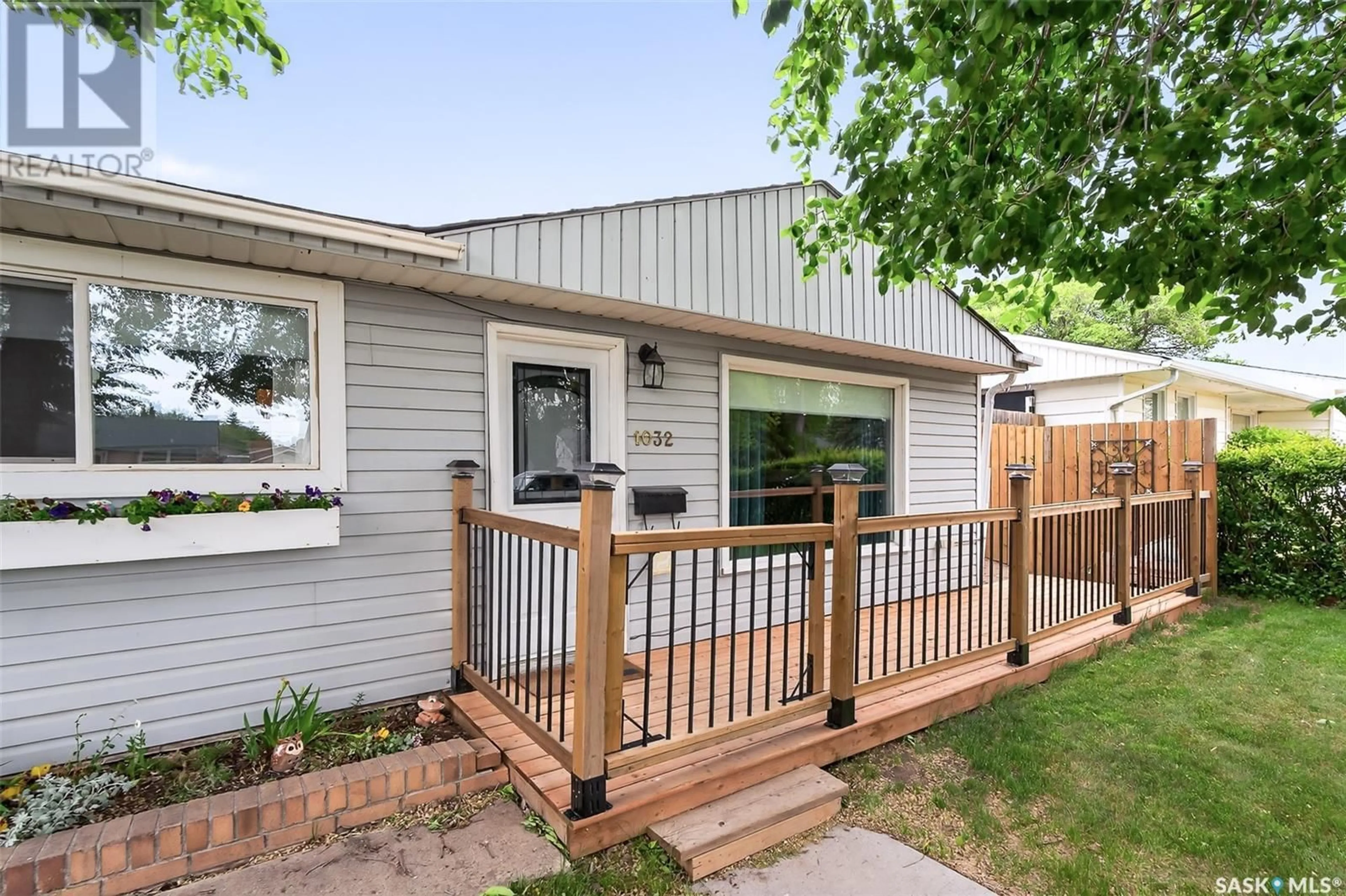 Home with vinyl exterior material, street for 1032 HALL STREET, Moose Jaw Saskatchewan S6H2S6