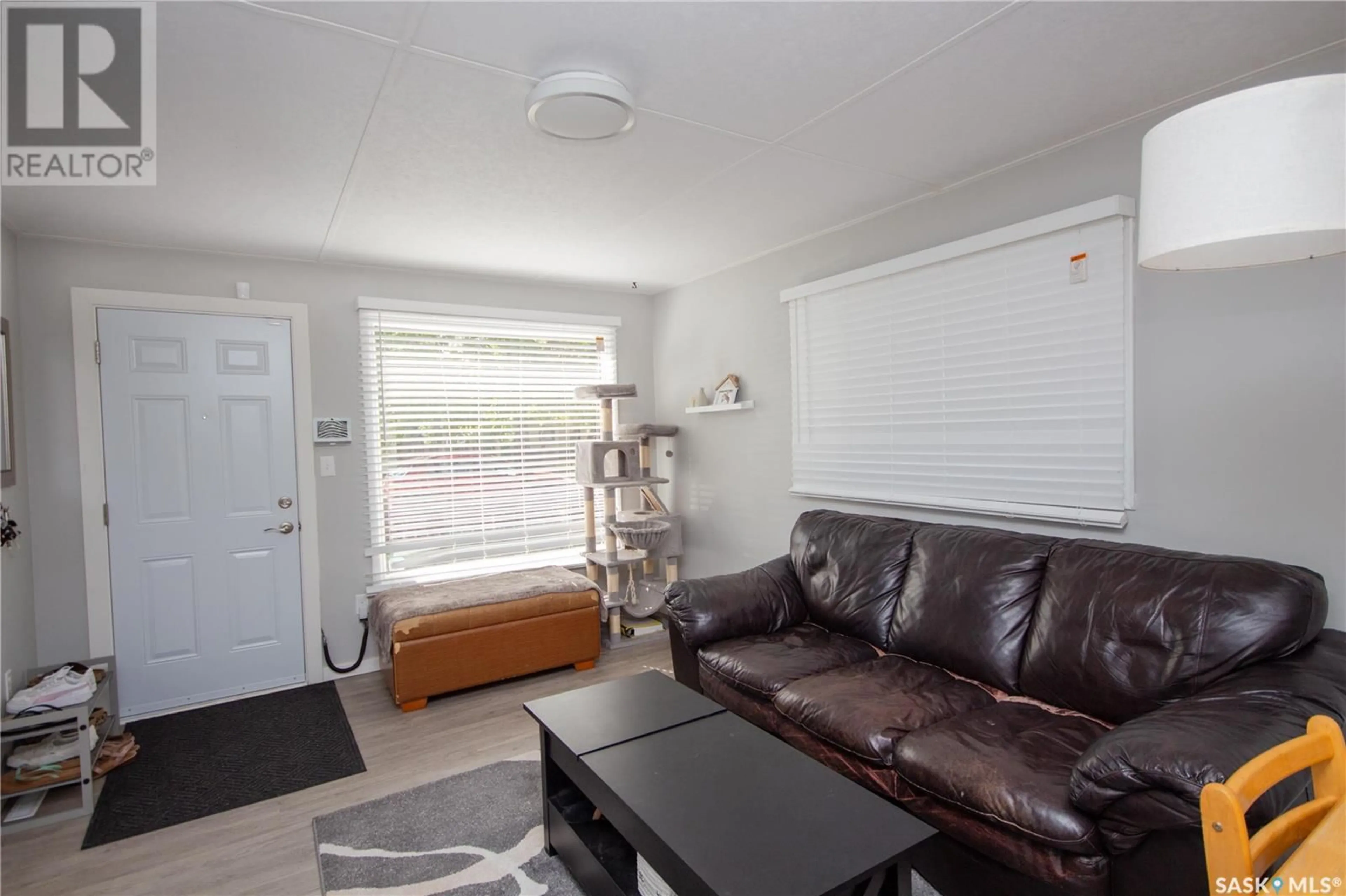Living room with furniture, unknown for 632 102ND STREET, North Battleford Saskatchewan S9A1E1