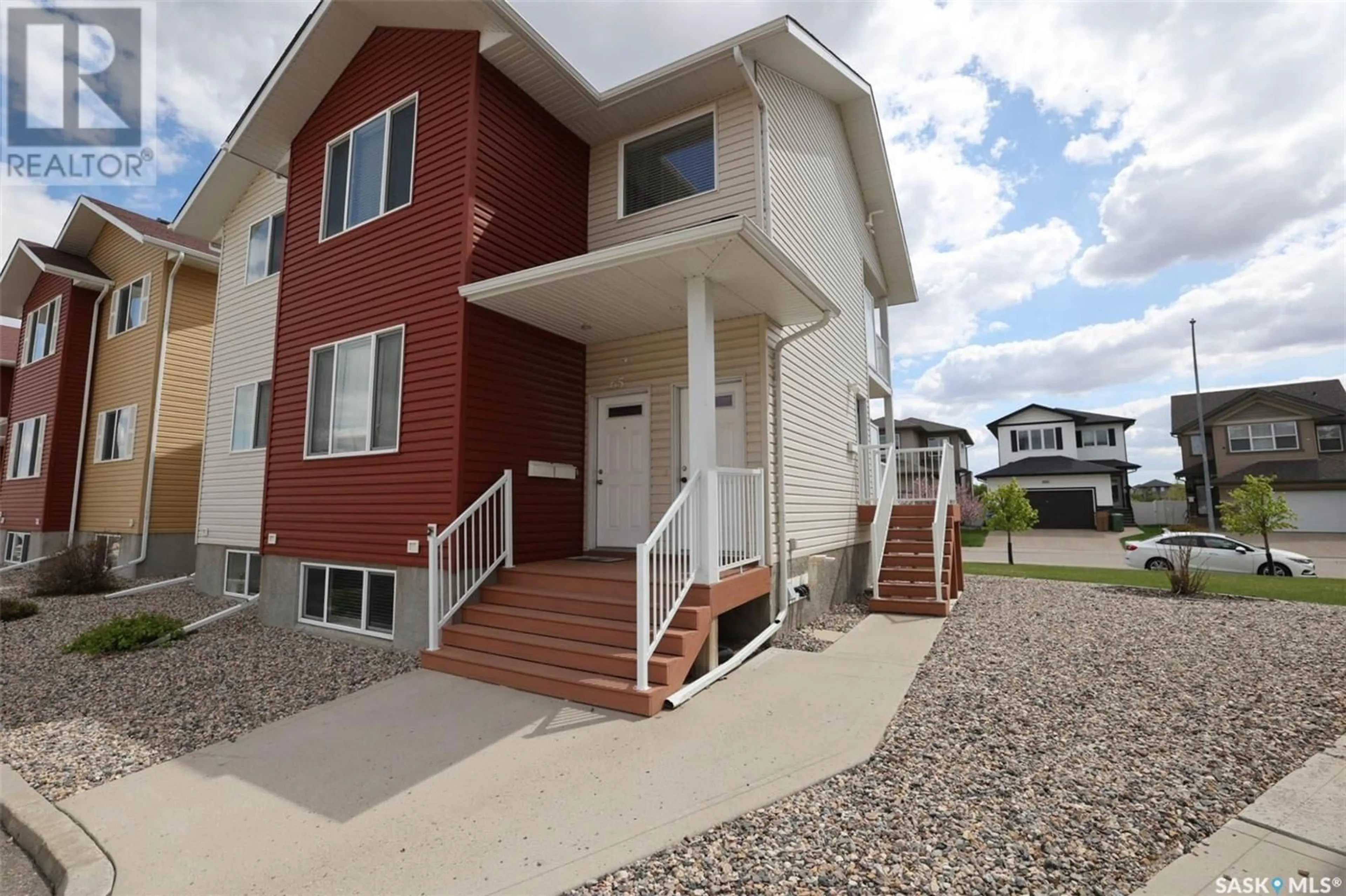 Home with vinyl exterior material, street for 64 5004 JAMES HILL ROAD, Regina Saskatchewan S4W0E8