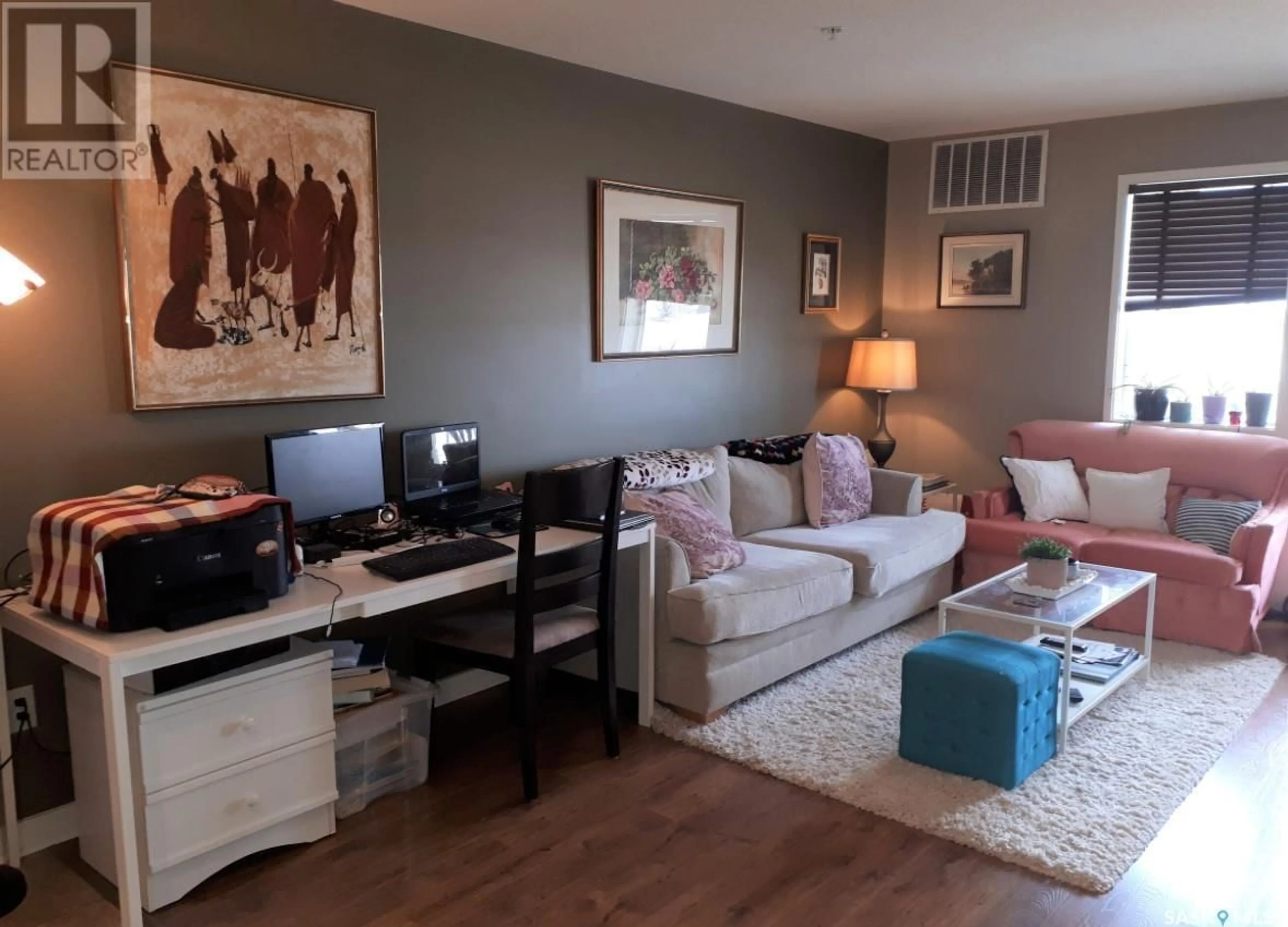 Living room with furniture, wood/laminate floor for 3351 - 415 EASTGATE BAY, Regina Saskatchewan S4Z0A9