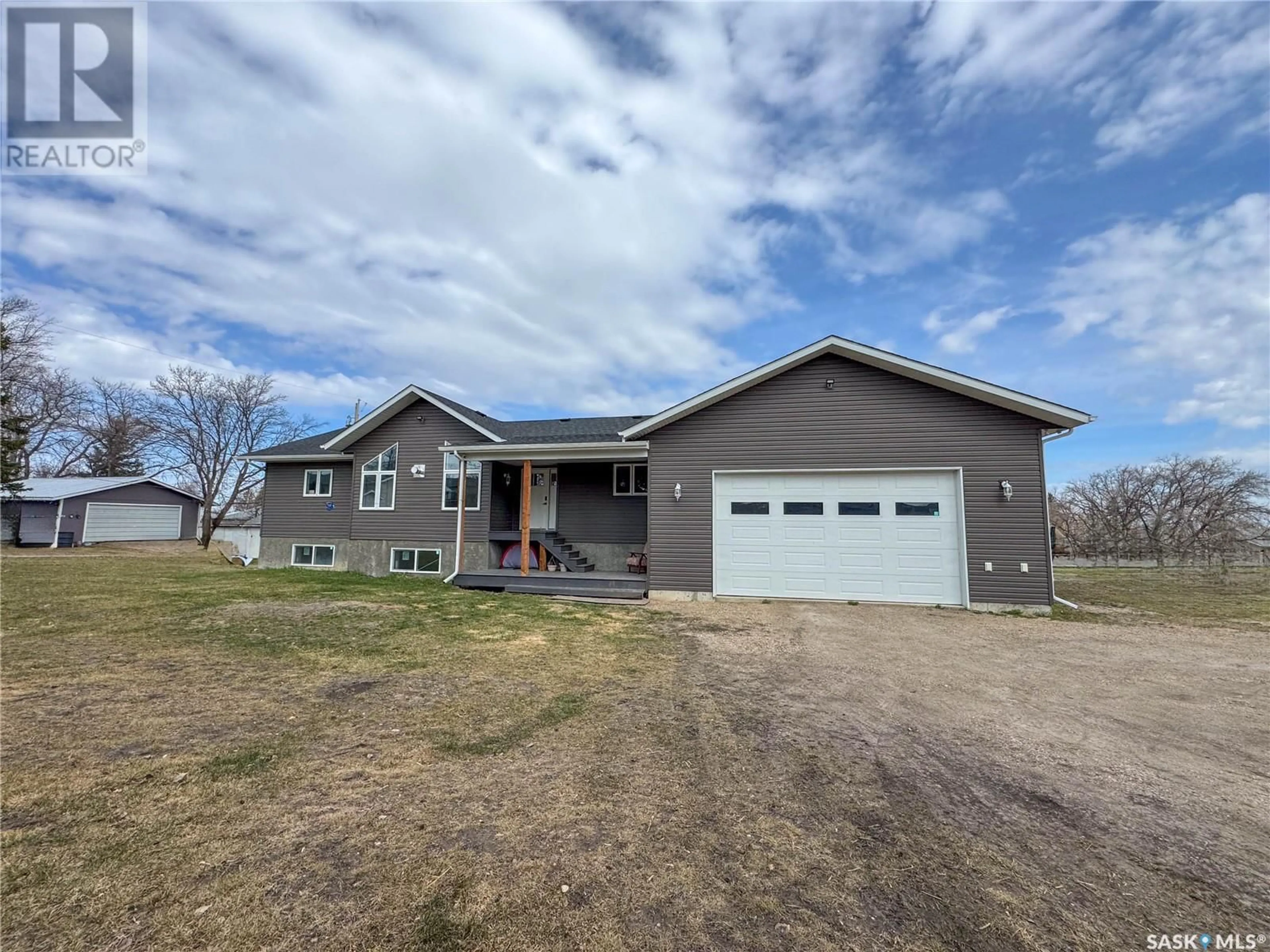 A pic from outside/outdoor area/front of a property/back of a property/a pic from drone, unknown for 105 4TH STREET, Birch Hills Saskatchewan S0J0G0