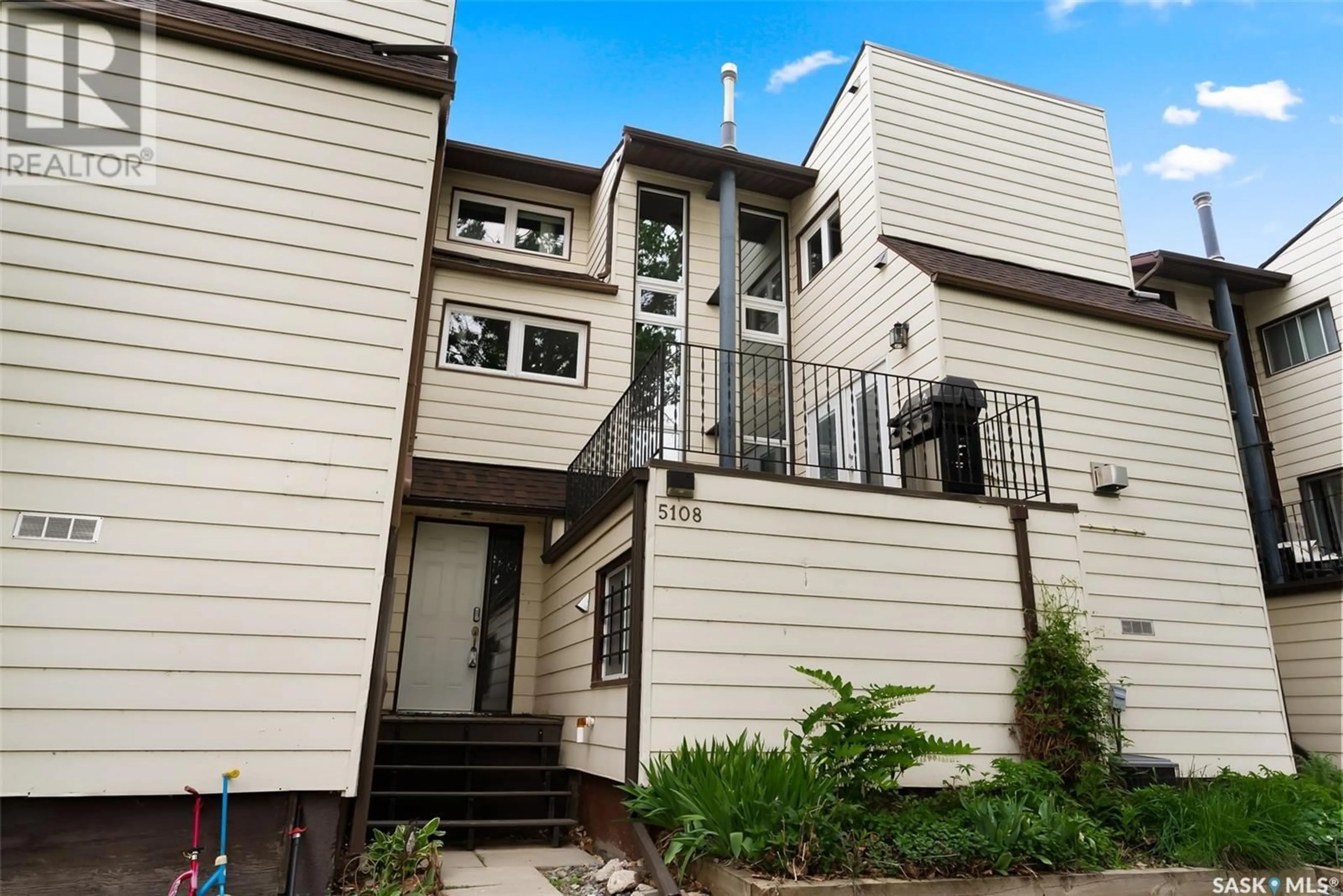 Home with vinyl exterior material, street for 5108 10TH AVENUE, Regina Saskatchewan S4T7P5