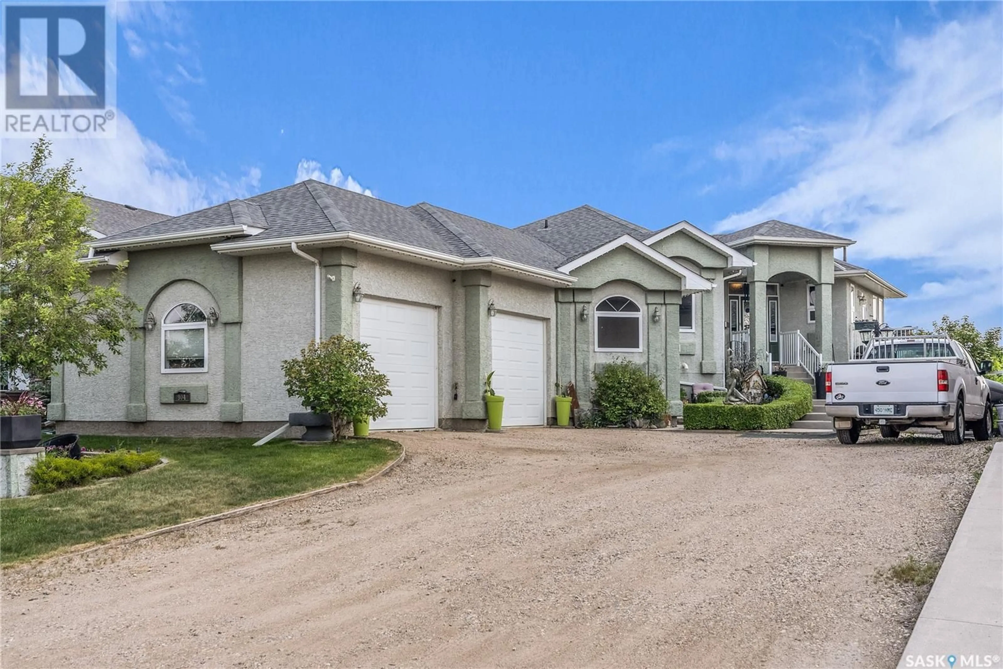 Home with vinyl exterior material, street for 904 WATER RIDGE CRESCENT, Humboldt Saskatchewan S0K2A0