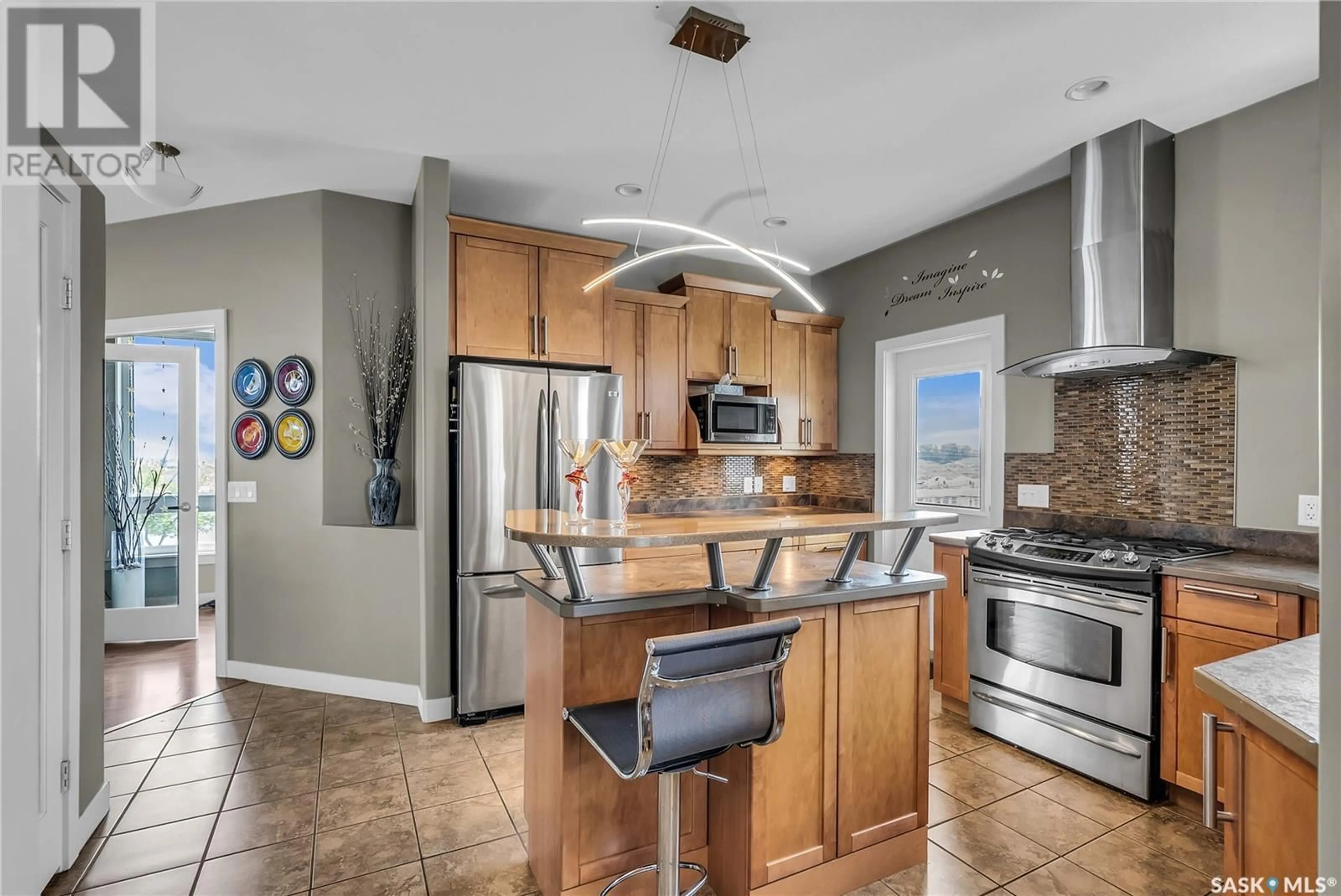 Open concept kitchen, ceramic/tile floor for 904 WATER RIDGE CRESCENT, Humboldt Saskatchewan S0K2A0