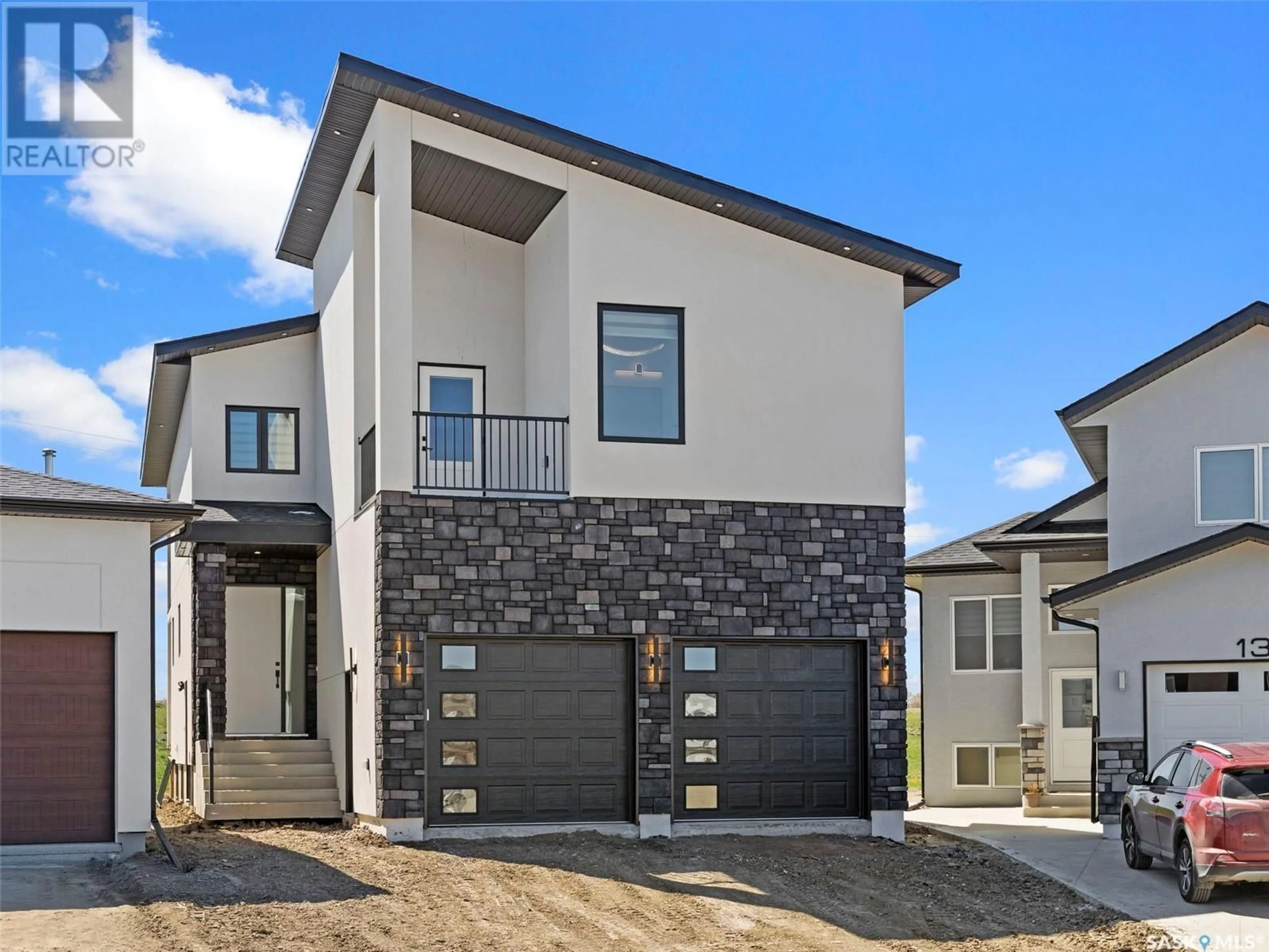 Home with brick exterior material, street for 134 MAZUREK CRESCENT, Saskatoon Saskatchewan S7V1S1