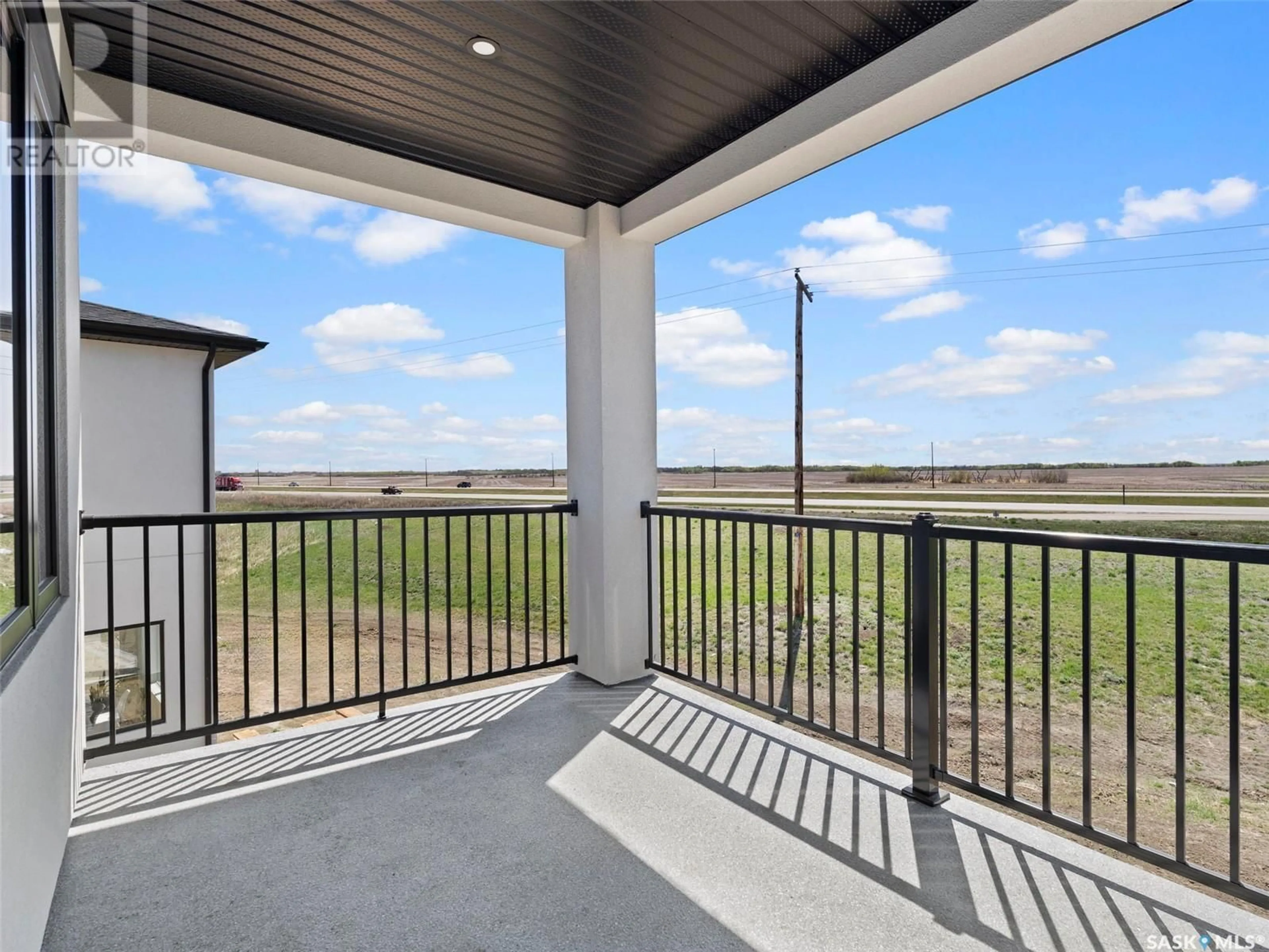 Patio, water/lake/river/ocean view for 134 MAZUREK CRESCENT, Saskatoon Saskatchewan S7V1S1