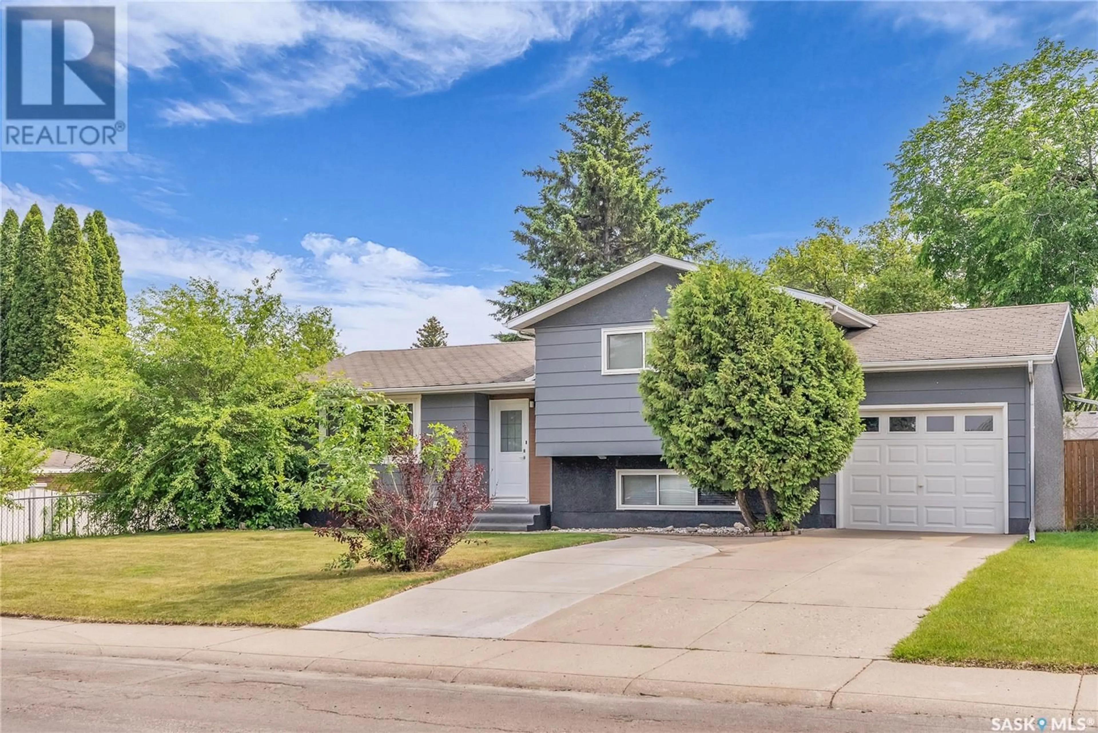 Home with vinyl exterior material, street for 240 DALHOUSIE CRESCENT, Saskatoon Saskatchewan S7H3R8