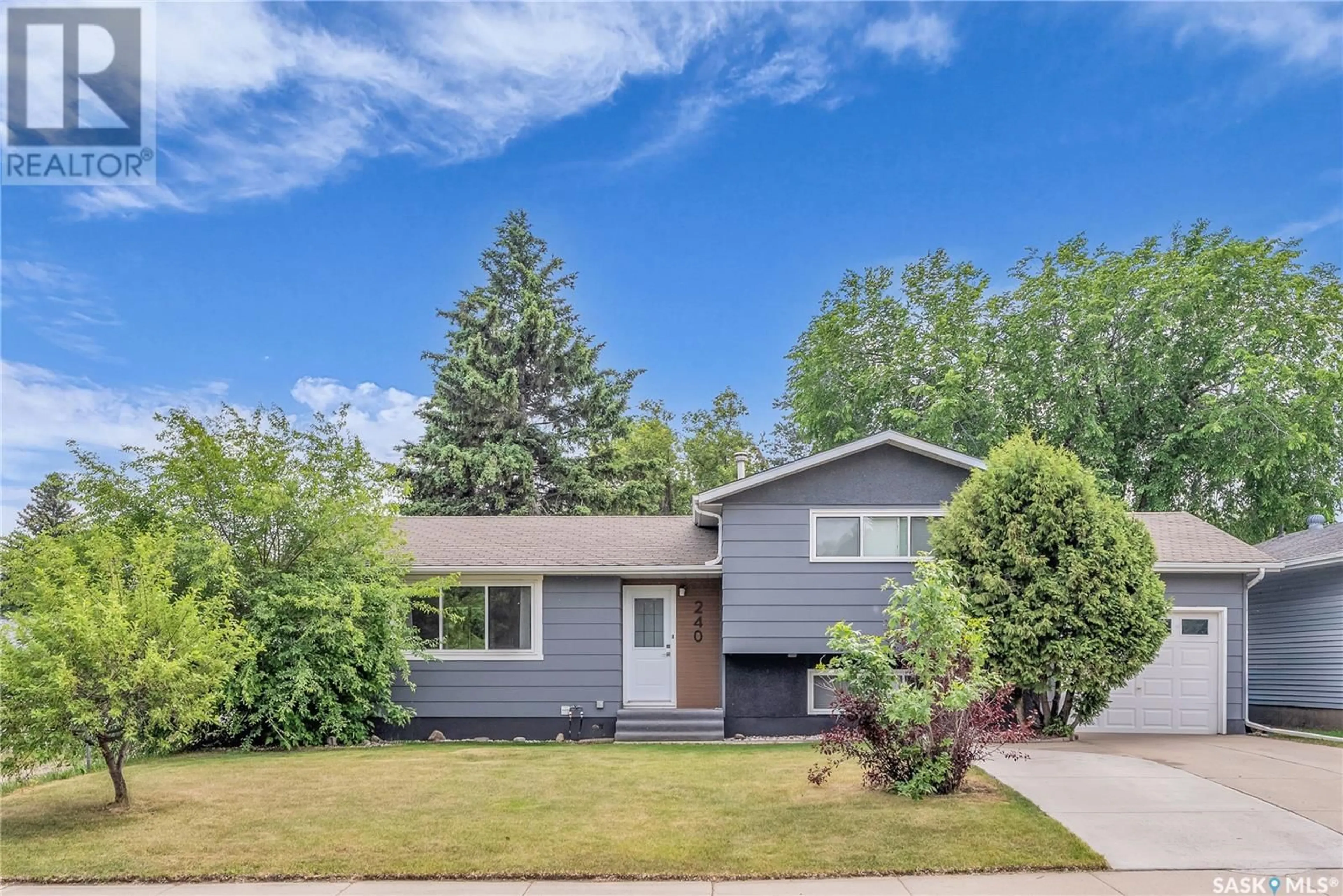 Home with vinyl exterior material, street for 240 DALHOUSIE CRESCENT, Saskatoon Saskatchewan S7H3R8