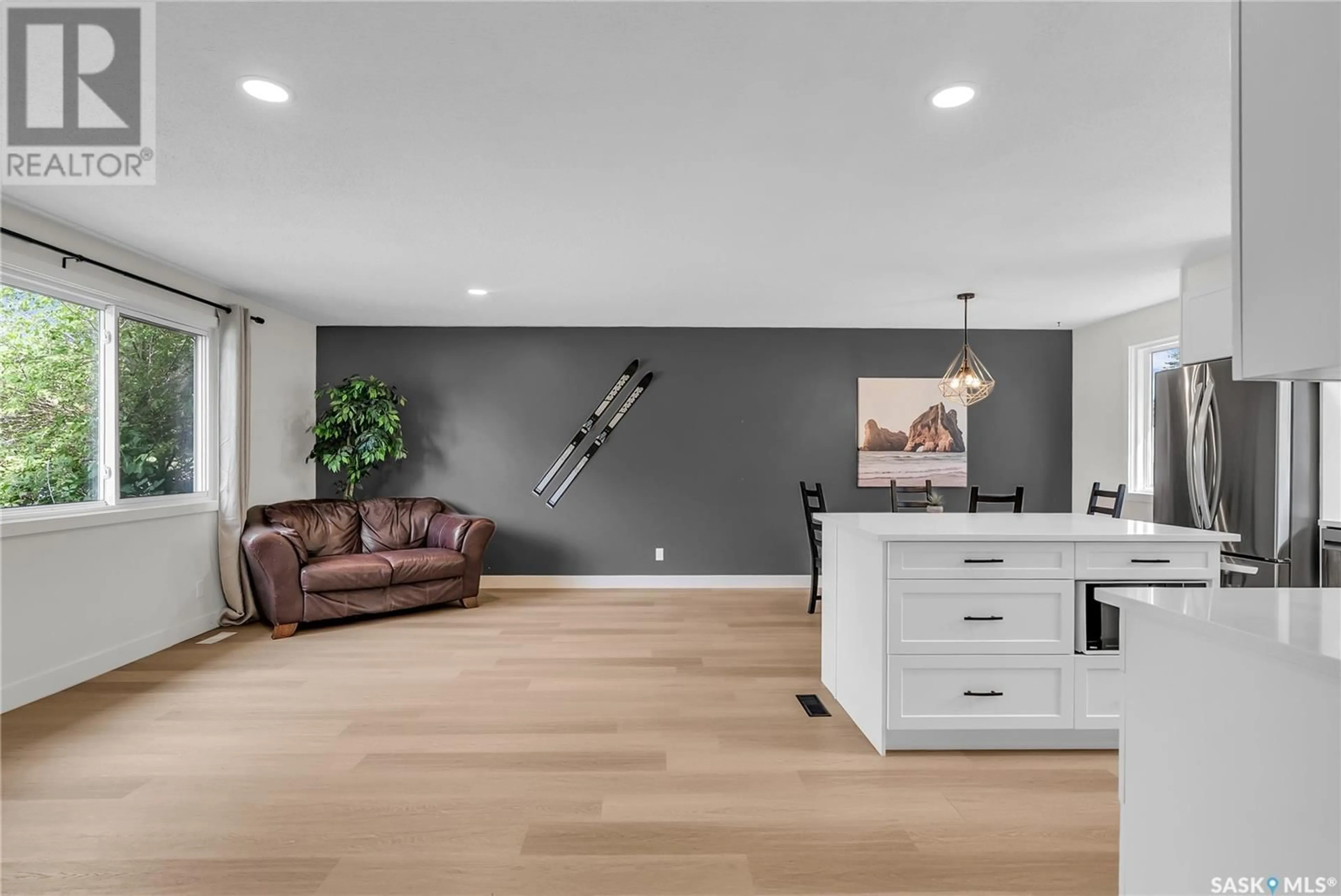 Open concept kitchen, wood/laminate floor for 240 DALHOUSIE CRESCENT, Saskatoon Saskatchewan S7H3R8