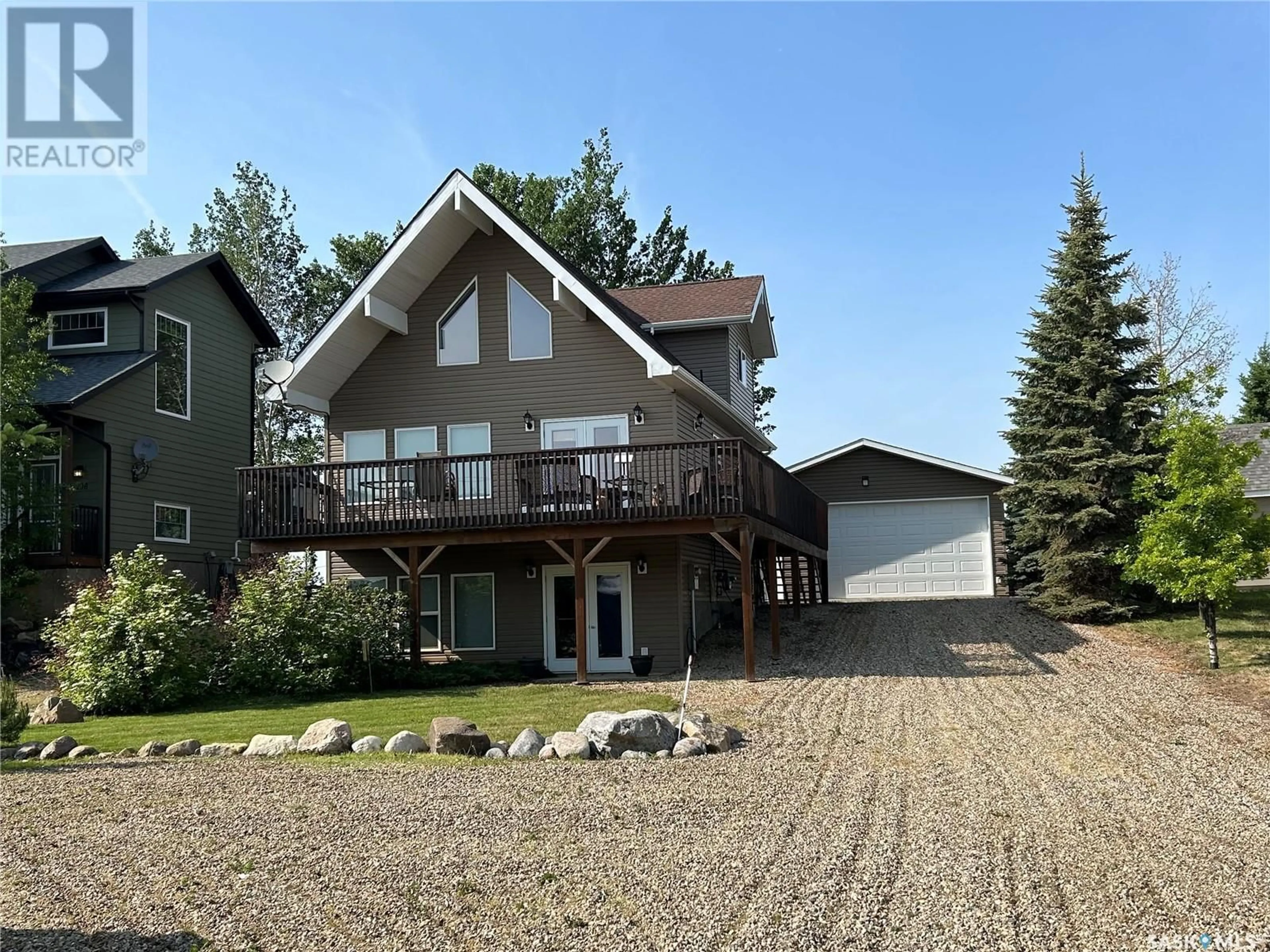 Home with vinyl exterior material, unknown for 104 SUNRIDGE ROAD, Pebble Baye Saskatchewan S0J2G0