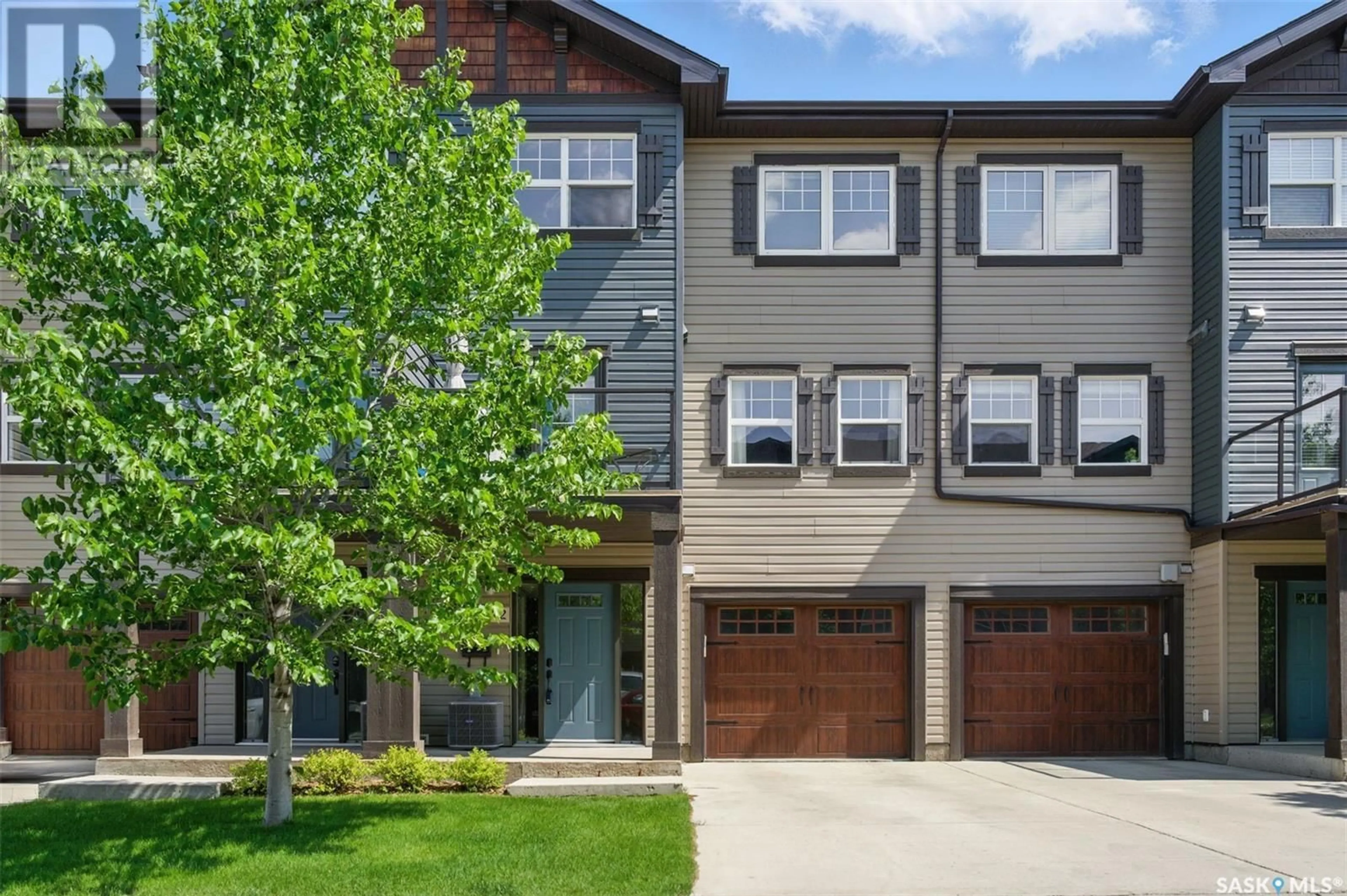 Home with vinyl exterior material, street for 542 150 LANGLOIS WAY, Saskatoon Saskatchewan S7T0K9