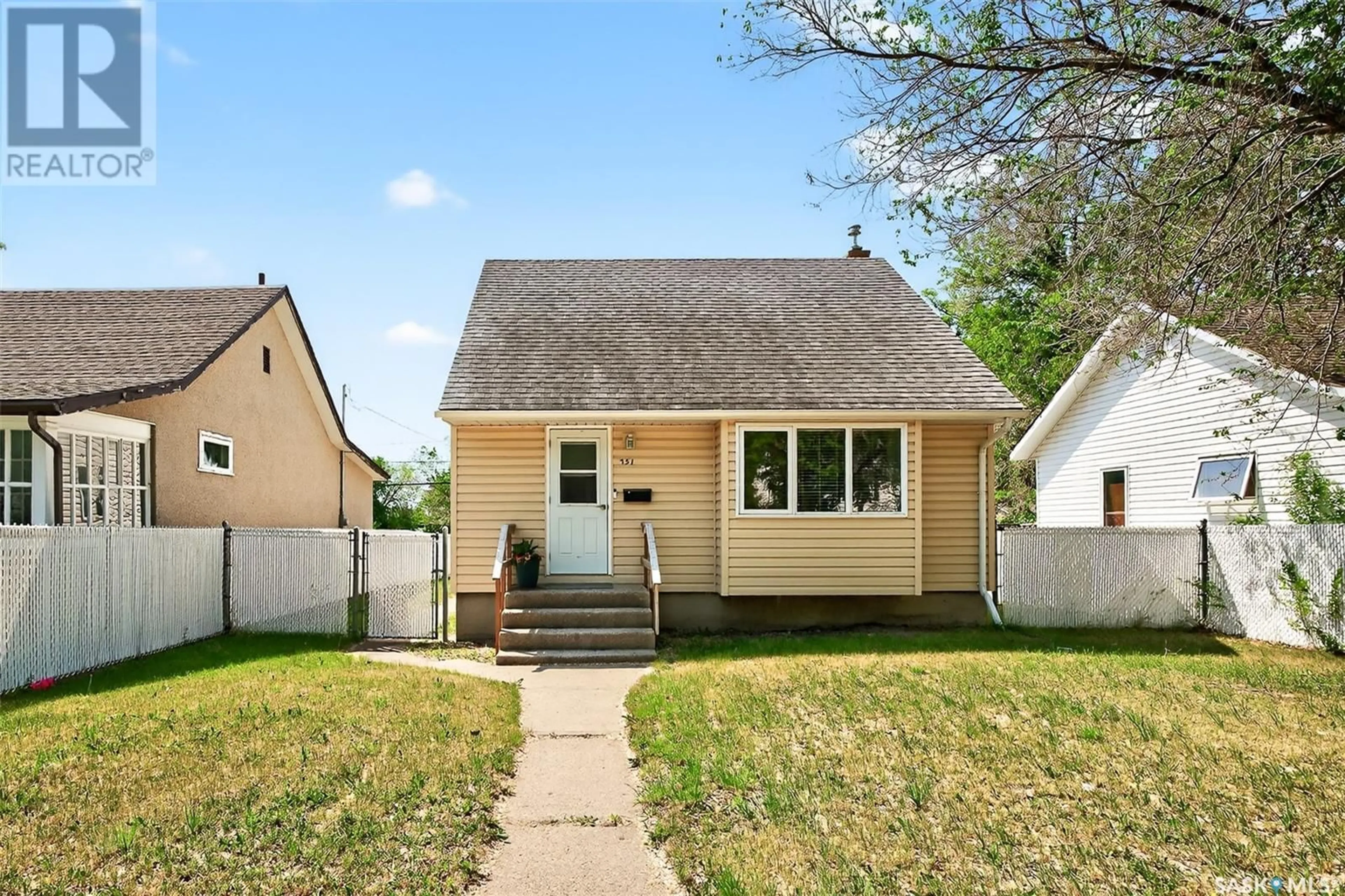 Home with vinyl exterior material, street for 751 OMINICA STREET, Moose Jaw Saskatchewan S6H0H7