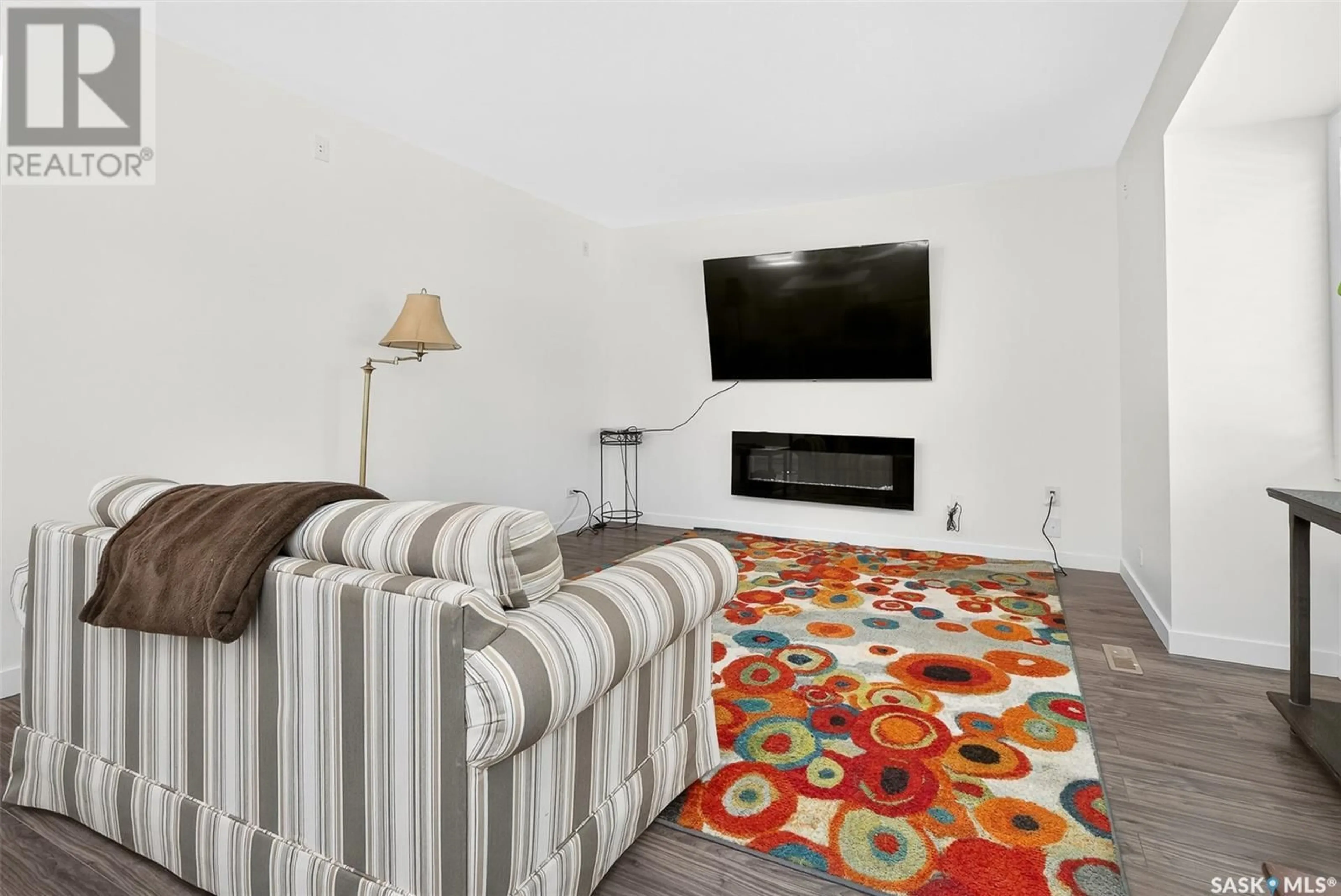 Living room with furniture, carpet floor for 751 OMINICA STREET, Moose Jaw Saskatchewan S6H0H7