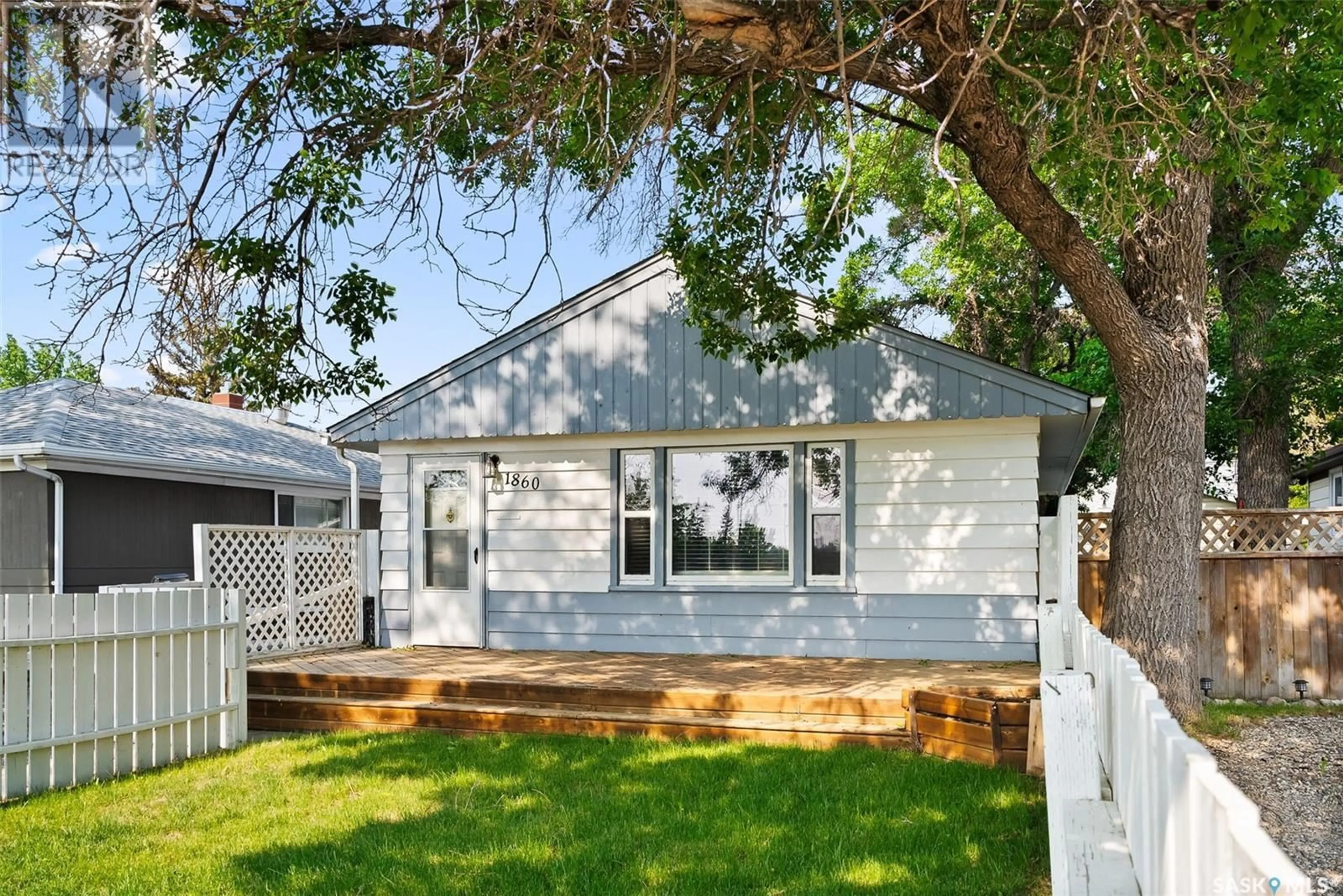 Home with vinyl exterior material, street for 1860 ALEXANDRA STREET, Regina Saskatchewan S4T4P3