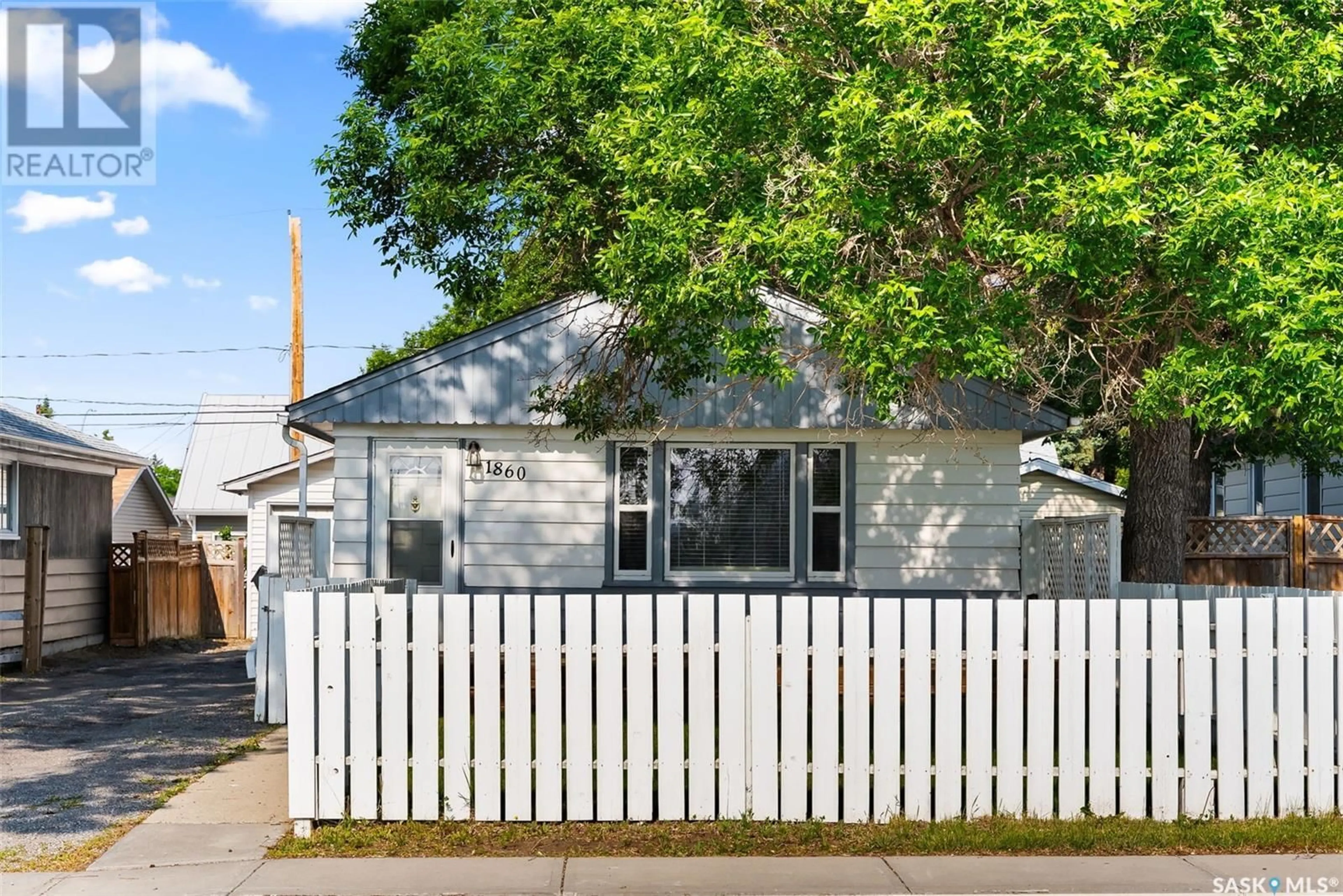 Home with vinyl exterior material, street for 1860 ALEXANDRA STREET, Regina Saskatchewan S4T4P3