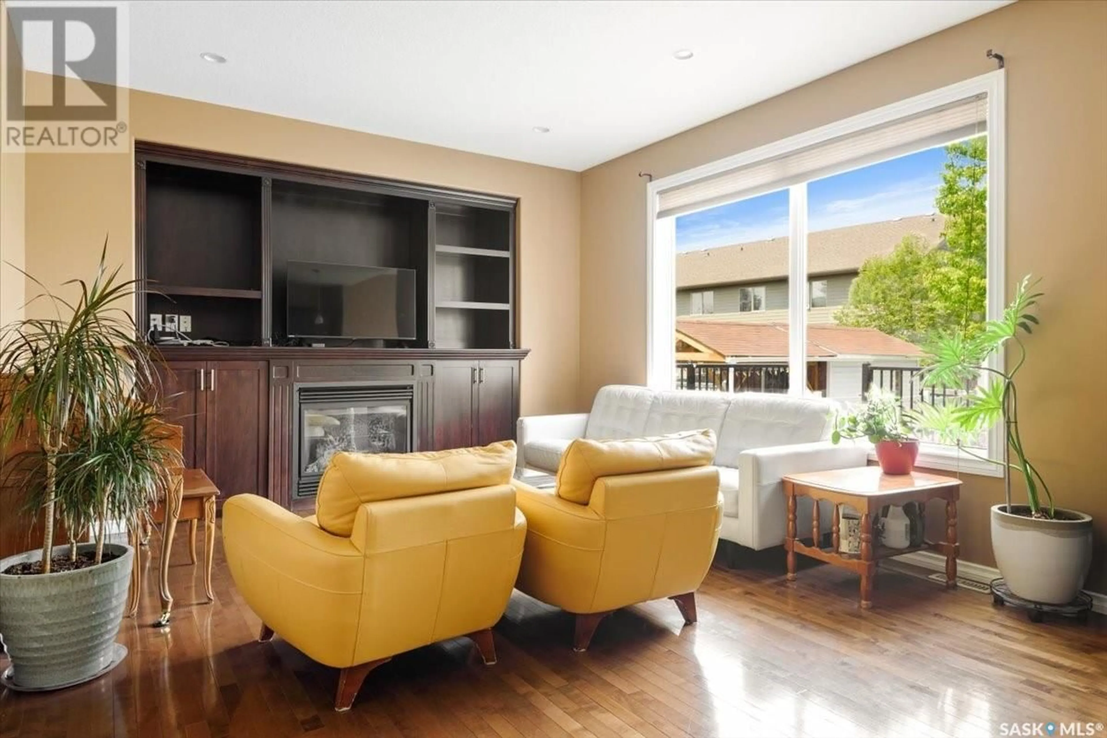 Living room with furniture, wood/laminate floor for 4010 LEPINE ROAD, Regina Saskatchewan S4V1K4