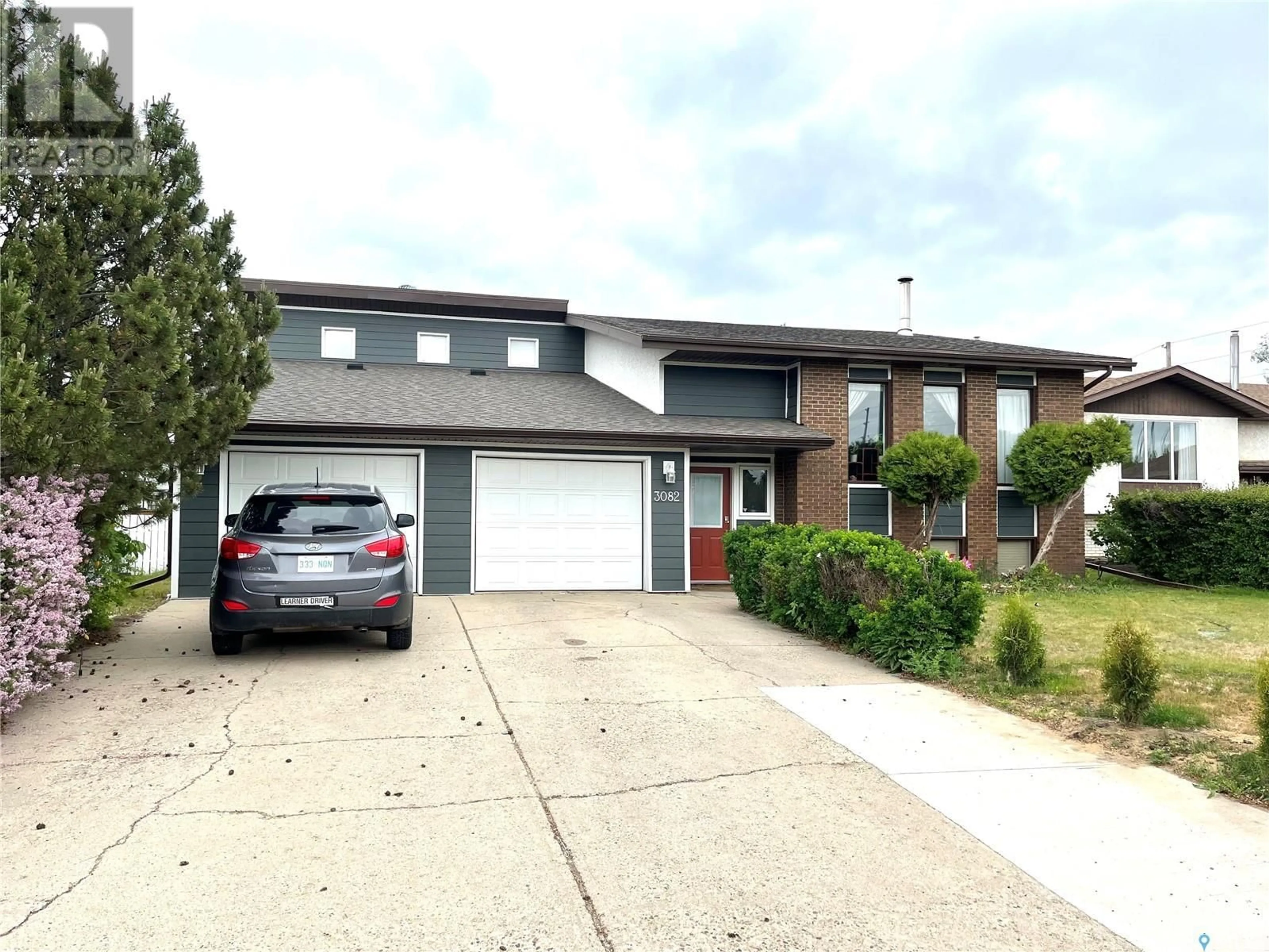 A pic from outside/outdoor area/front of a property/back of a property/a pic from drone, street for 3082 SHERMAN DRIVE, Prince Albert Saskatchewan S6V7H6