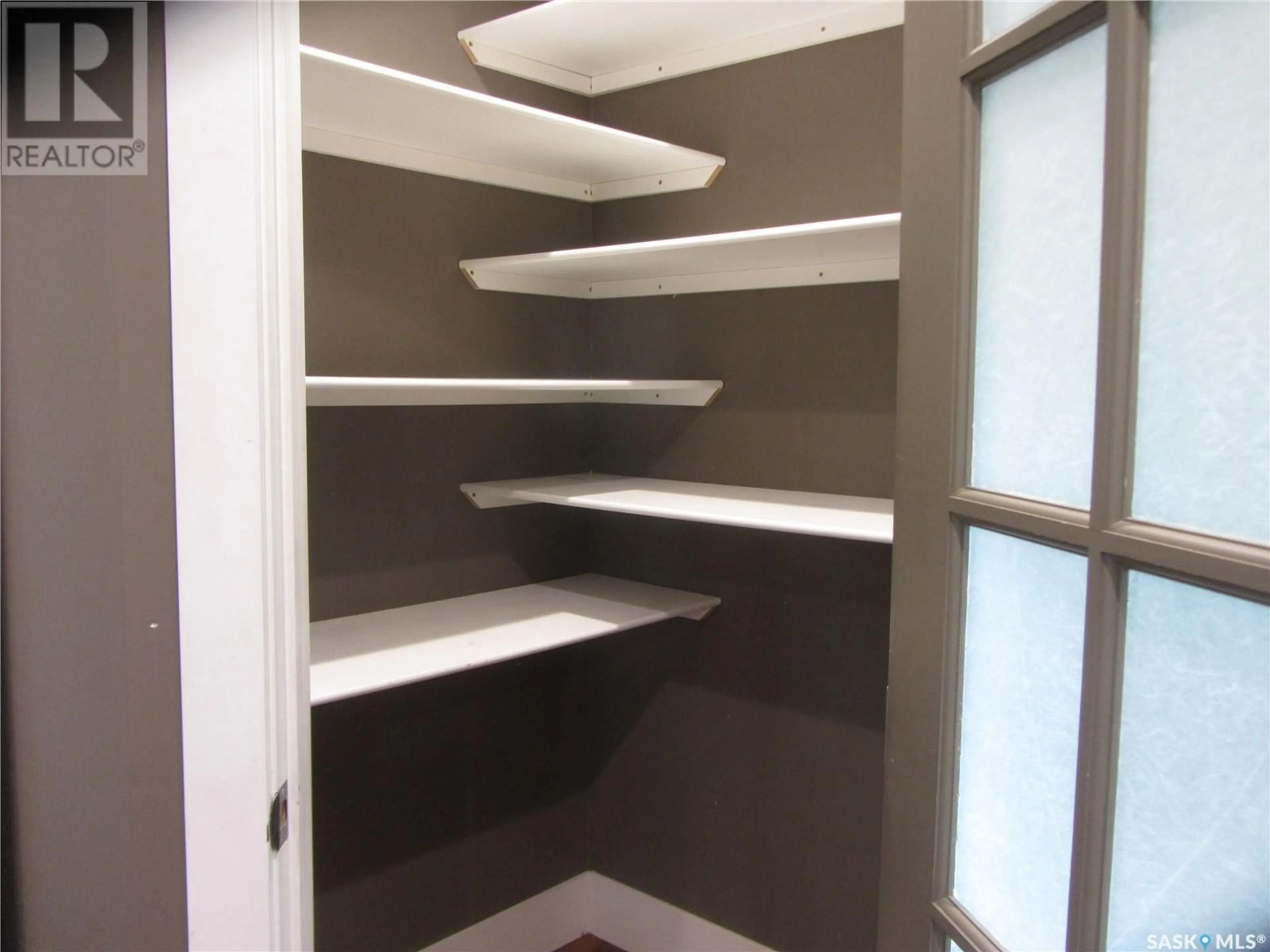 Storage room or clothes room or walk-in closet for 902 6TH STREET, Saskatoon Saskatchewan S7H1C9