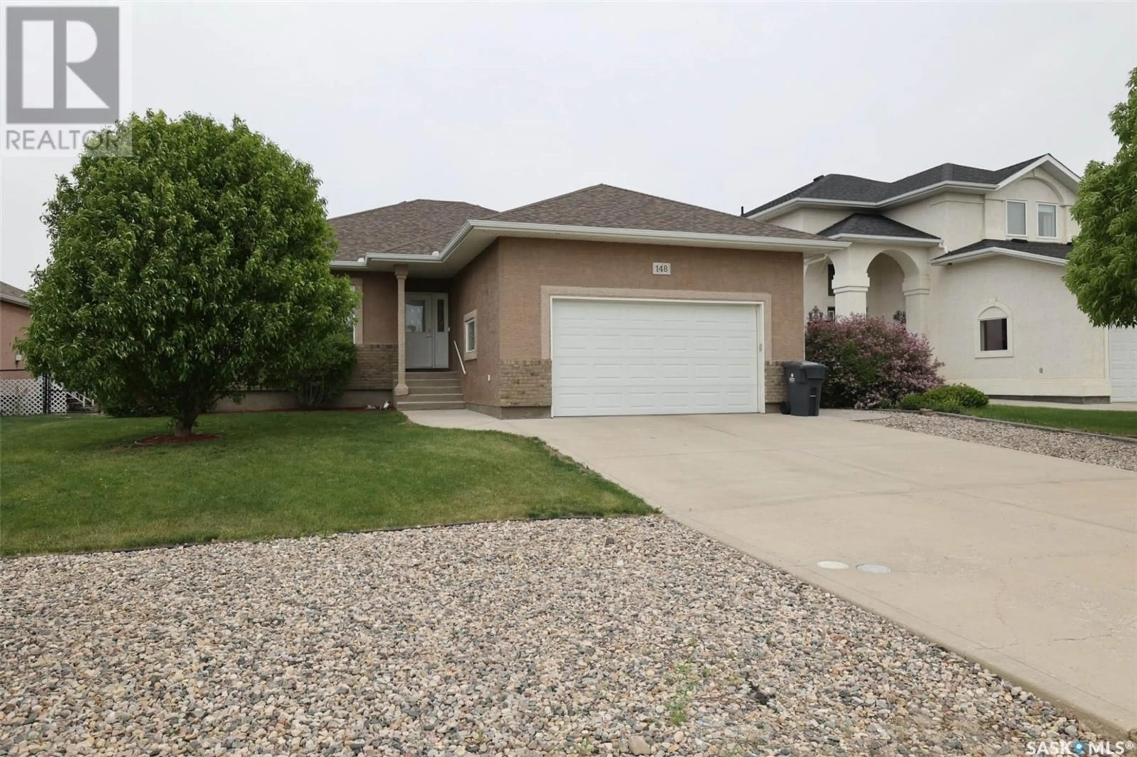 Home with vinyl exterior material, street for 148 FAIRWAY ROAD, Edenwold Rm No. 158 Saskatchewan S4L1C8