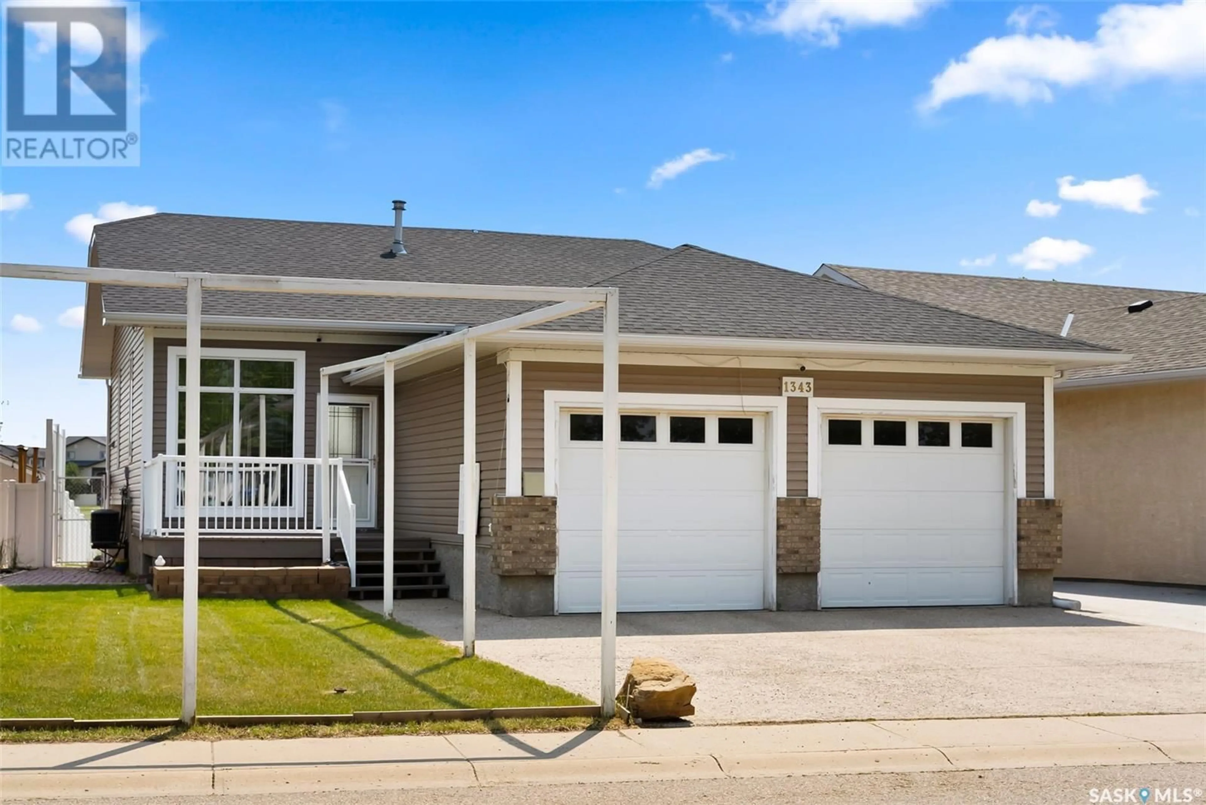 Home with vinyl exterior material, street for 1343 CHATWIN CRESCENT, Regina Saskatchewan S4N7N8