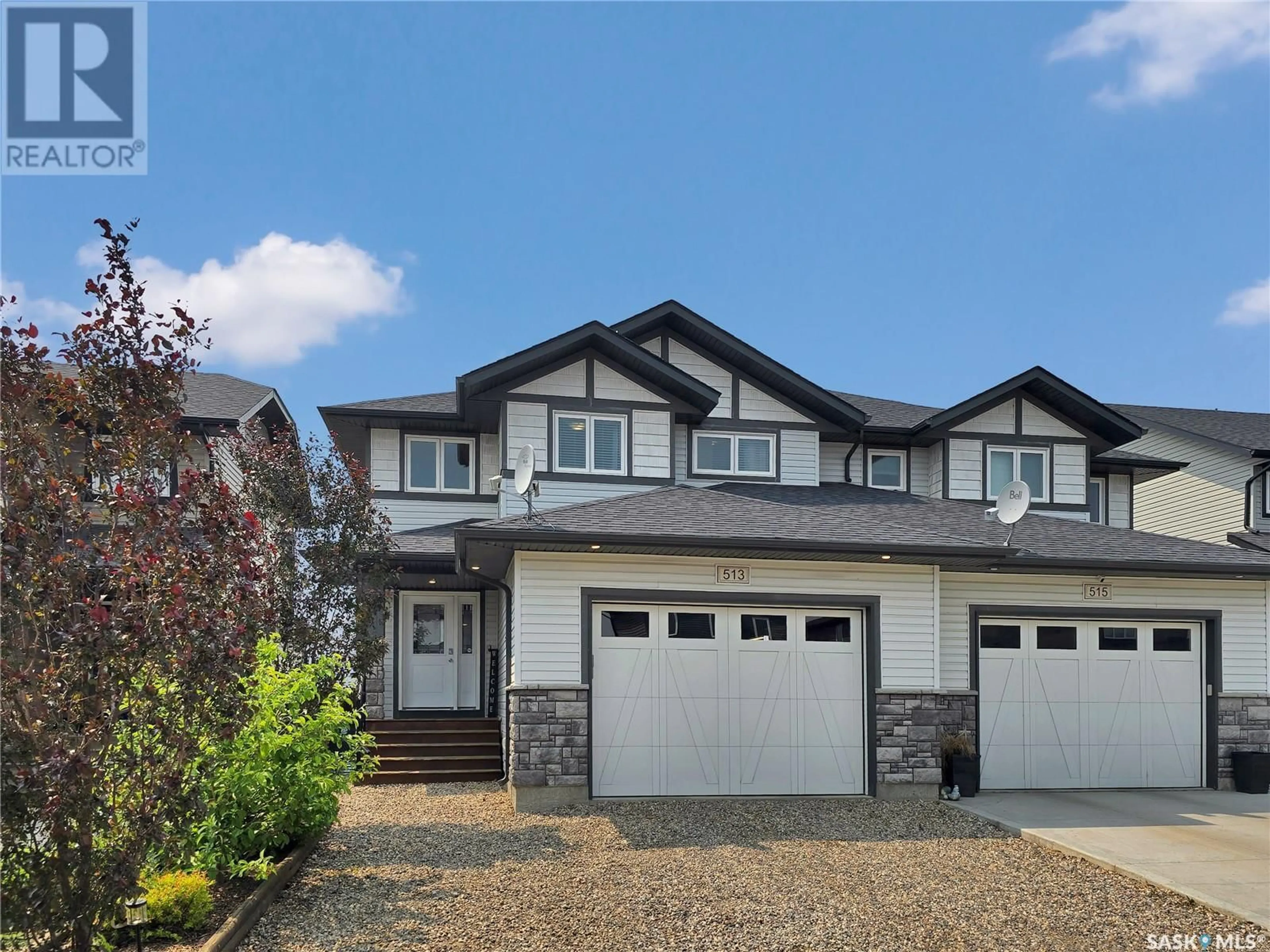 Home with vinyl exterior material, street for 513 MAPLE CRESCENT, Warman Saskatchewan S0K4S2